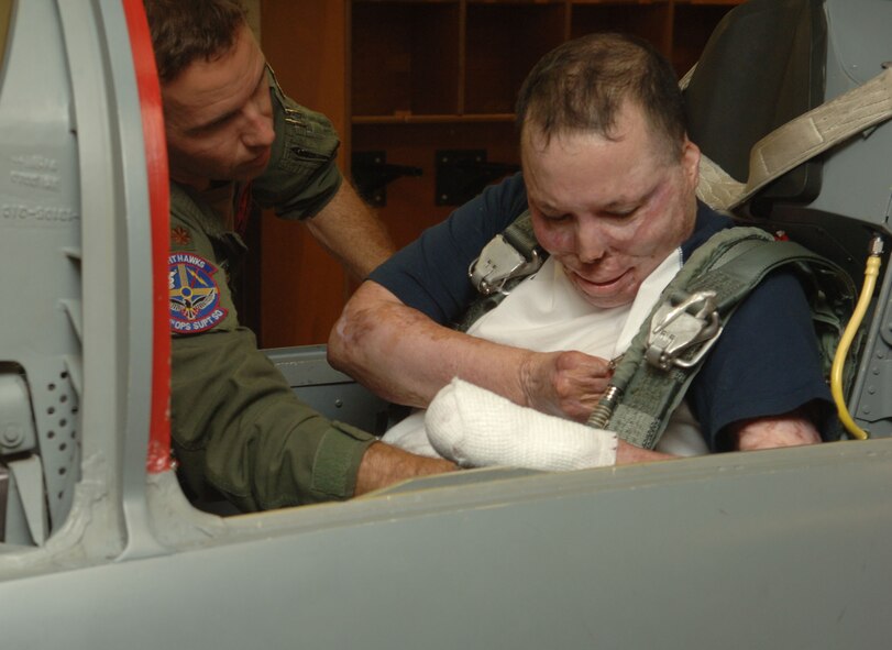 Tech Sgt. Israel DelToro and Master Sgt. Eric Brandenburg visit Holloman to get a tour of the base and tell Airmen their stories of being in combat and why they stay in the Air Force. Many Airmen were inspired by the speeches the two Air Force heroes gave during the Warrior Call. (U.S. Air Force photo/Airman 1st Class Tiffany Trojca.) 
