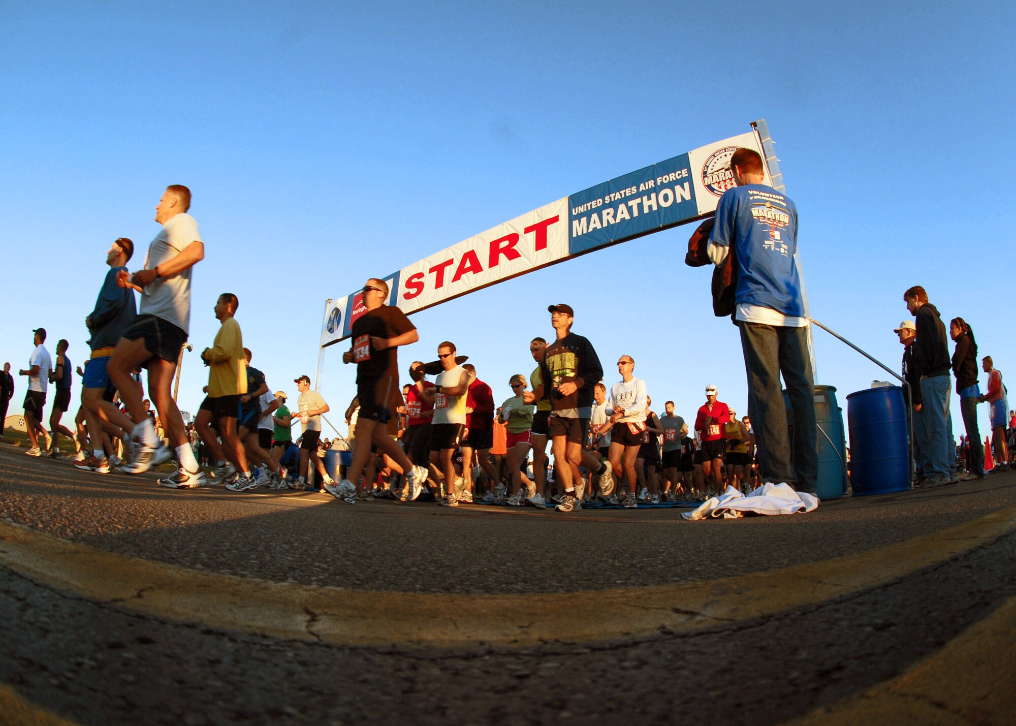 Participants take off at the start of the 11th annual U.S. Air Force Marathon Sept. 15 at Wright-Patterson Air Force Base, Ohio. Marathon events included the full marathon, half marathon, 5K race, four-person relay and wheelchair race. More than 6,300 runners participated in the five marathon events. (U.S. Air Force photo/Staff Sgt. Joshua Strang)