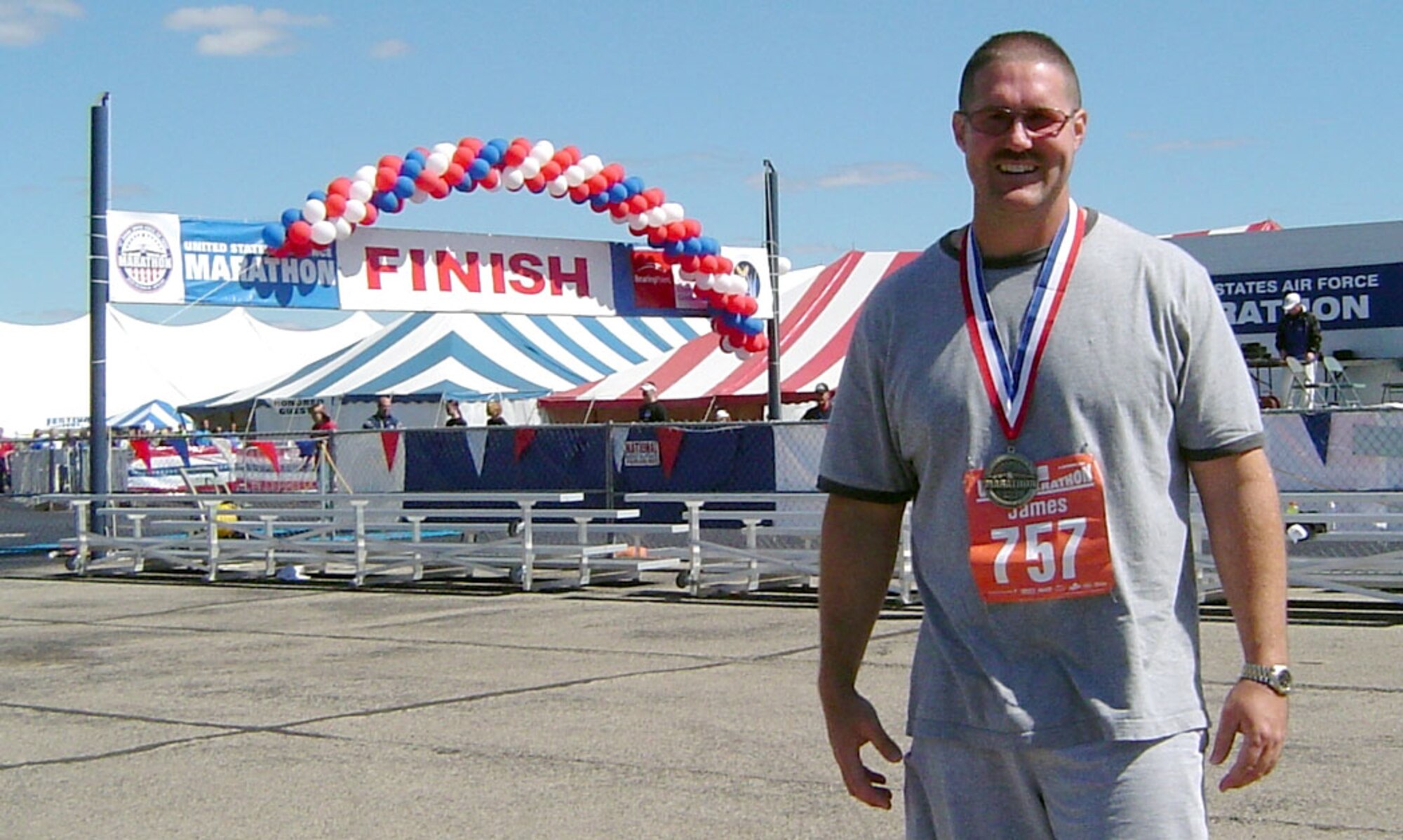 Master Sgt. Jimmy Jackson, 341st Logistics Readiness Squadron first sergeant, is all smiles after completing the 26.2-mile Air Force Marathon at Wright-Patterson Air Force Base, Ohio, Sept. 15. (Courtesy Photo)
