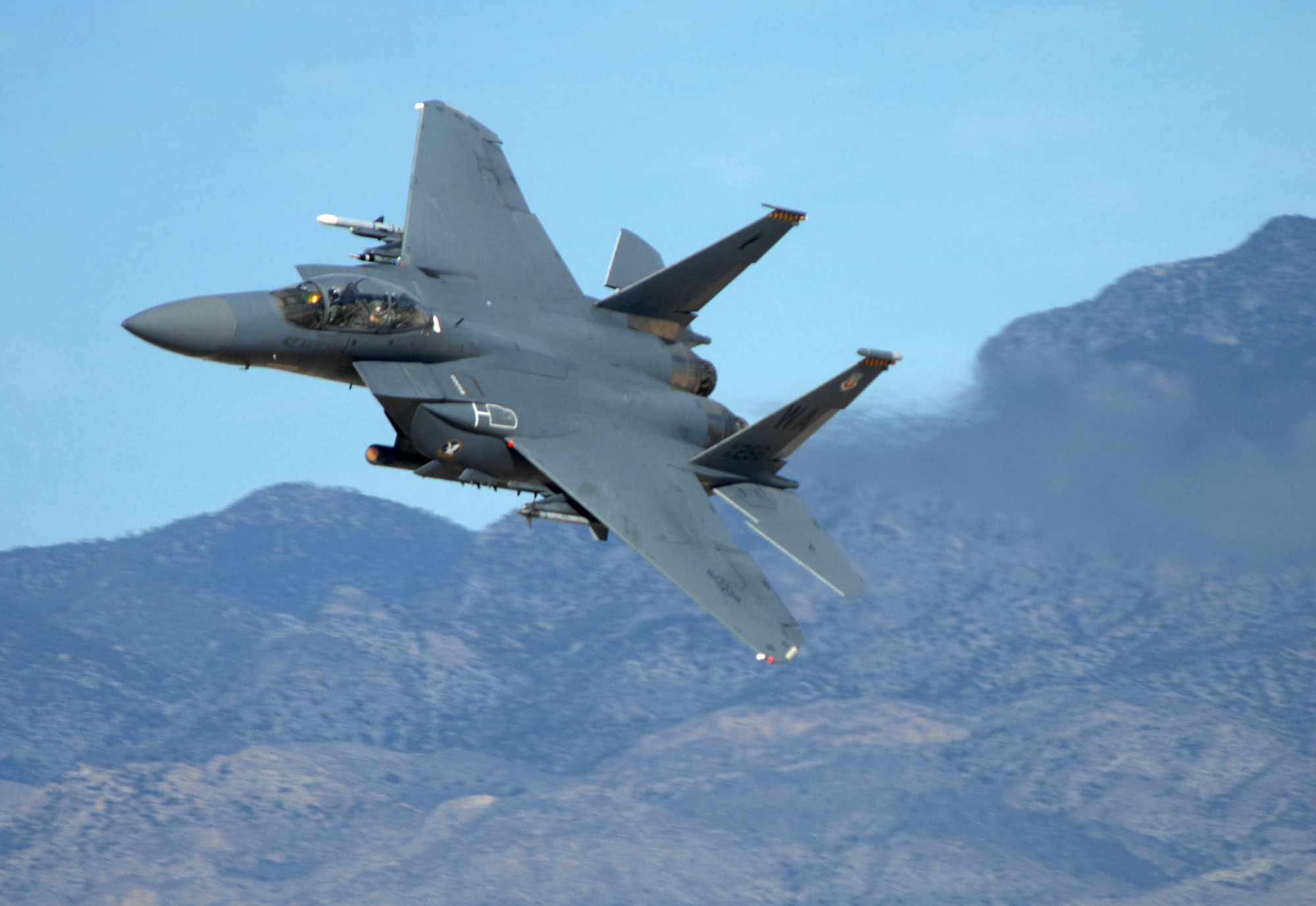 An F-15 Eagle assigned to Nellis Air Force Base, Nev., makes a high-speed pass during the firepower demonstration Sept. 14 at the Nevada Test and Training Range. The demonstration gave the general public a close-up and realistic view into the Air Force's ability to perform its wartime mission. (U.S. Air Force photo/Airman 1st Class Brian Ybarbo) 
