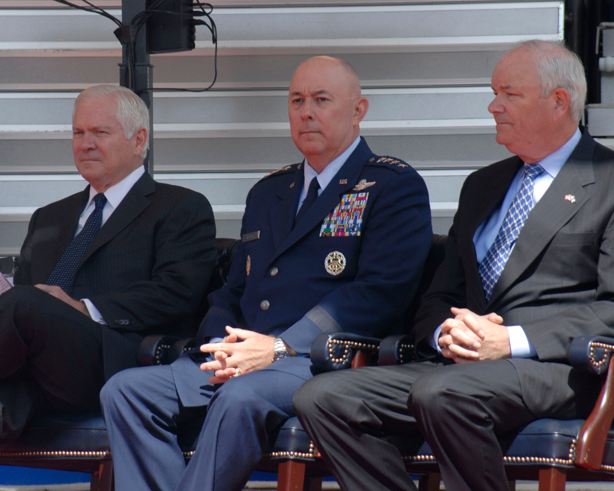 Secretary of Defense Robert Gates, Air Force Chief of Staff General T. Michael Mosely and Secretary of the Air Force Michael W. Wynne observe events from the stage at the Air Force 60th anniversary celebration in the Pentagon courtyard Sept. 18. (U.S. Air Force photo/Staff Sgt. Monique Randolph)