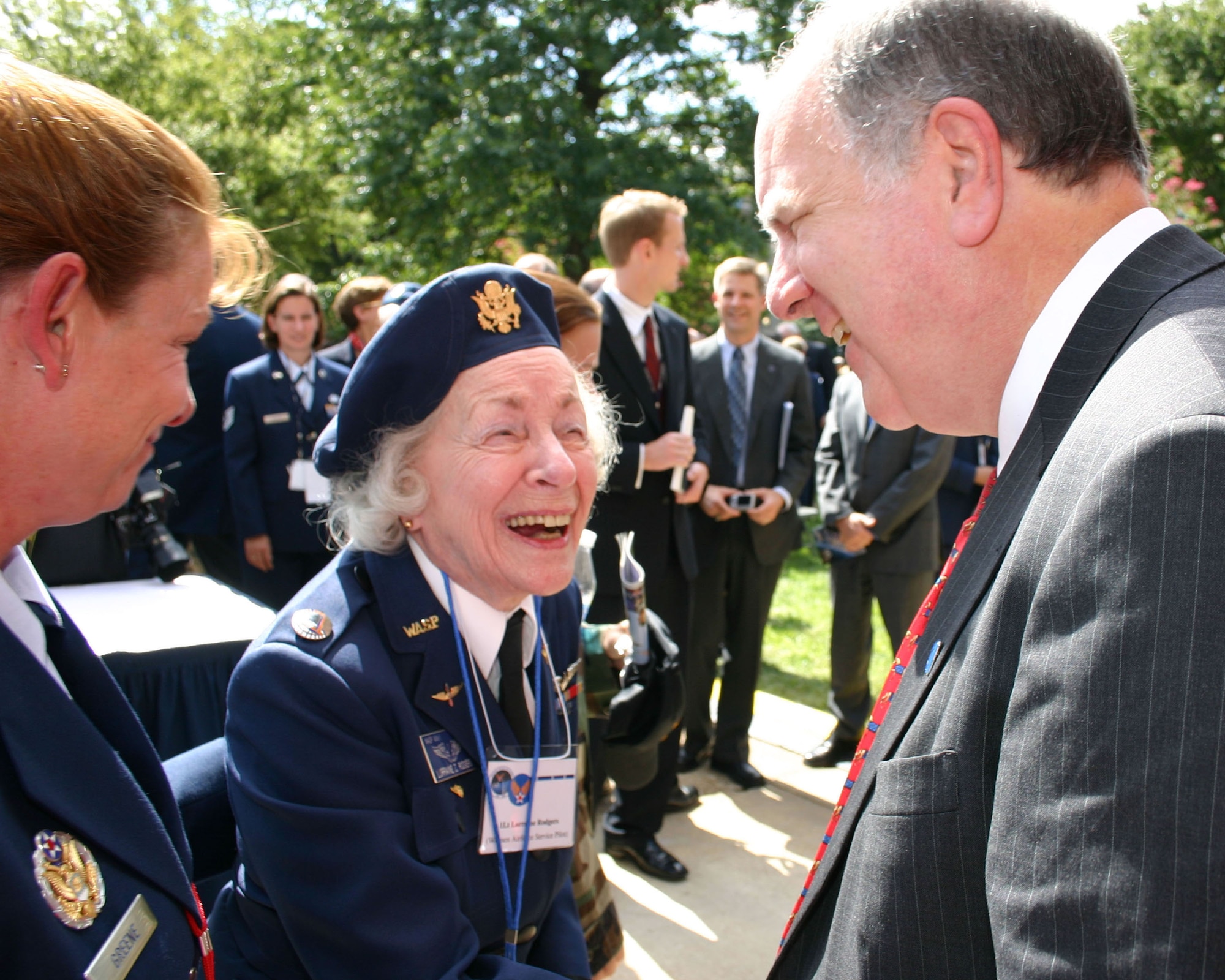 Women Airforce Service Pilot Lt. Lorraine Rodgers greets U.S. Rep. John Spratt of South Carolina during the Air Force's 60th anniversary celebration in the Pentagon courtyard Sept. 18. (U.S. Air Force photo/Senior Master Sgt. Ray Sarracino)
