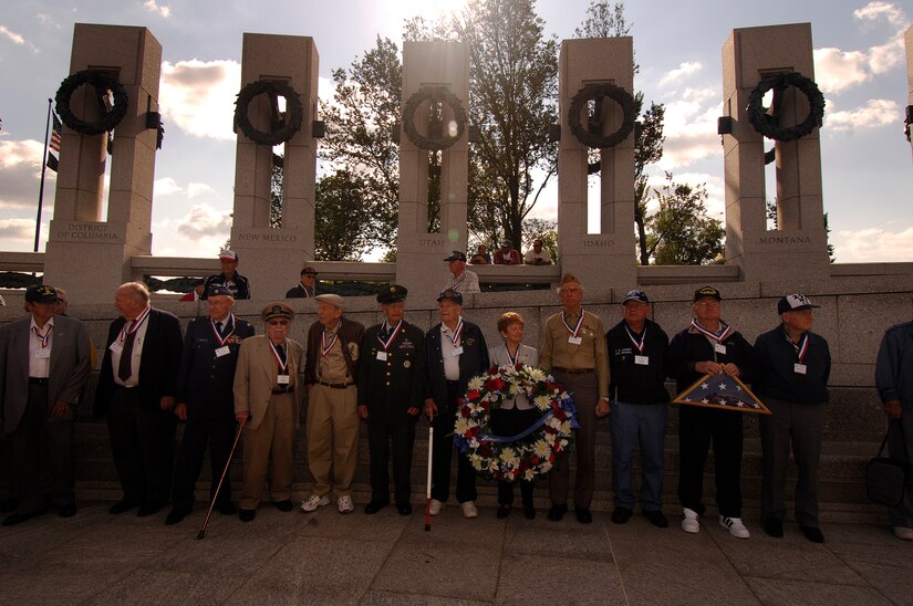 World War II veterans from Utah place a wreath in memory of fellow veterans during the Hero Flight 2007 program at the WWII Memorial, Washington D.C.(US Air Force/SSgt Suzanne Day)