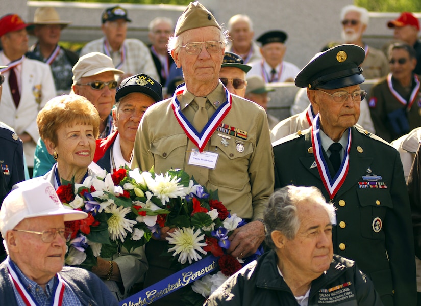 World War II veterans from Utah place a wreath from the Hero Flight 2007 program at the National World War II Memorial in Washington, D.C., Sept. 15. Hero Flight is an all-volunteer program that sets up trips to allow as many World War II veterans as possible to visit the National World War II Memorial. (U.S. Air Force photo/Staff Sgt. Suzanne Day)