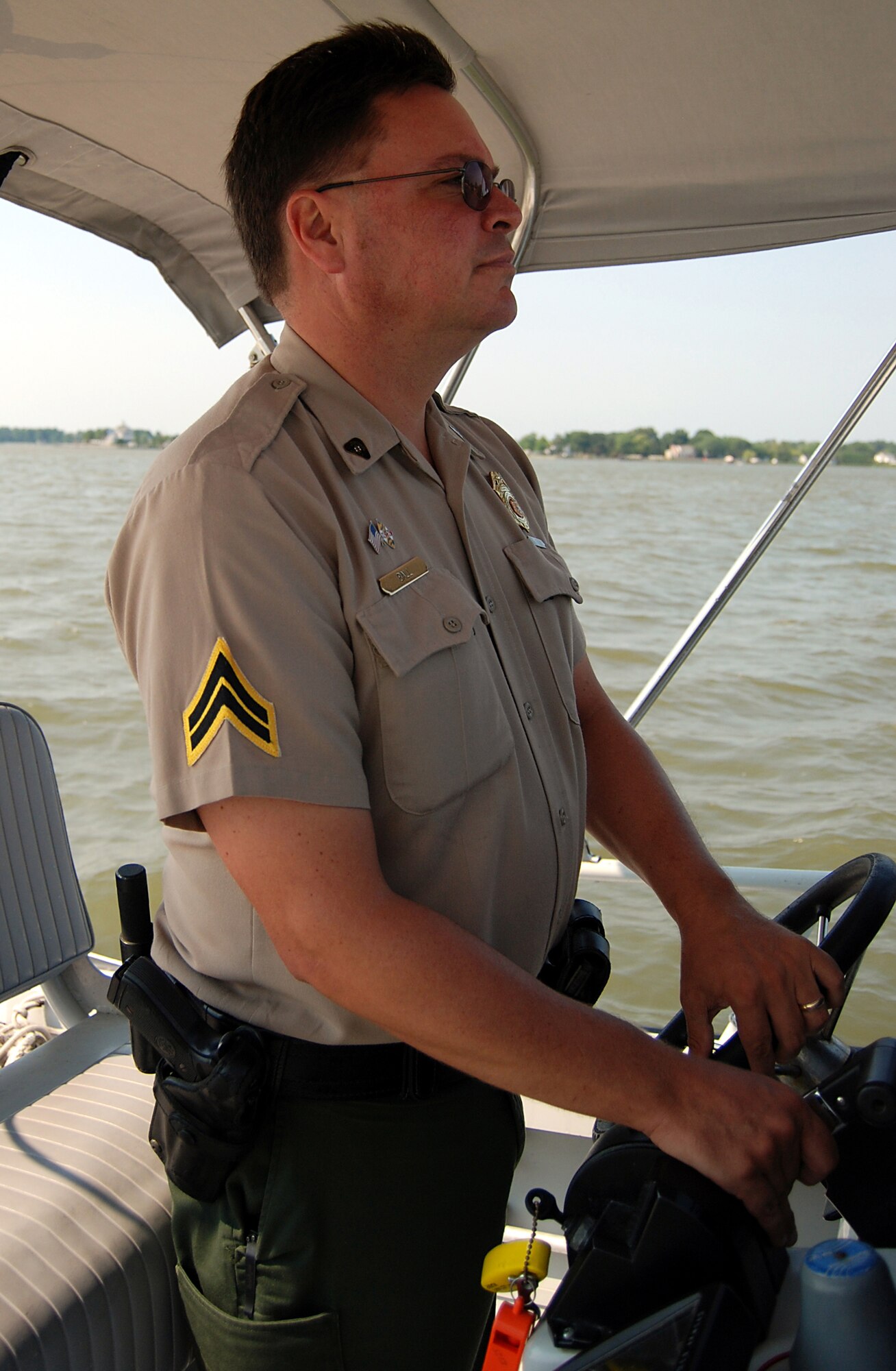 DOVER AIR FORCE BASE, Del. -- When Chaplain (Capt.) Barry Ball isn't working as a reservist for the 512th Airlift Wing here, he works full-time as a corporal for the Maryland Department of Natural Resources patrolling the land and waters near Tilghman Island, Md.      