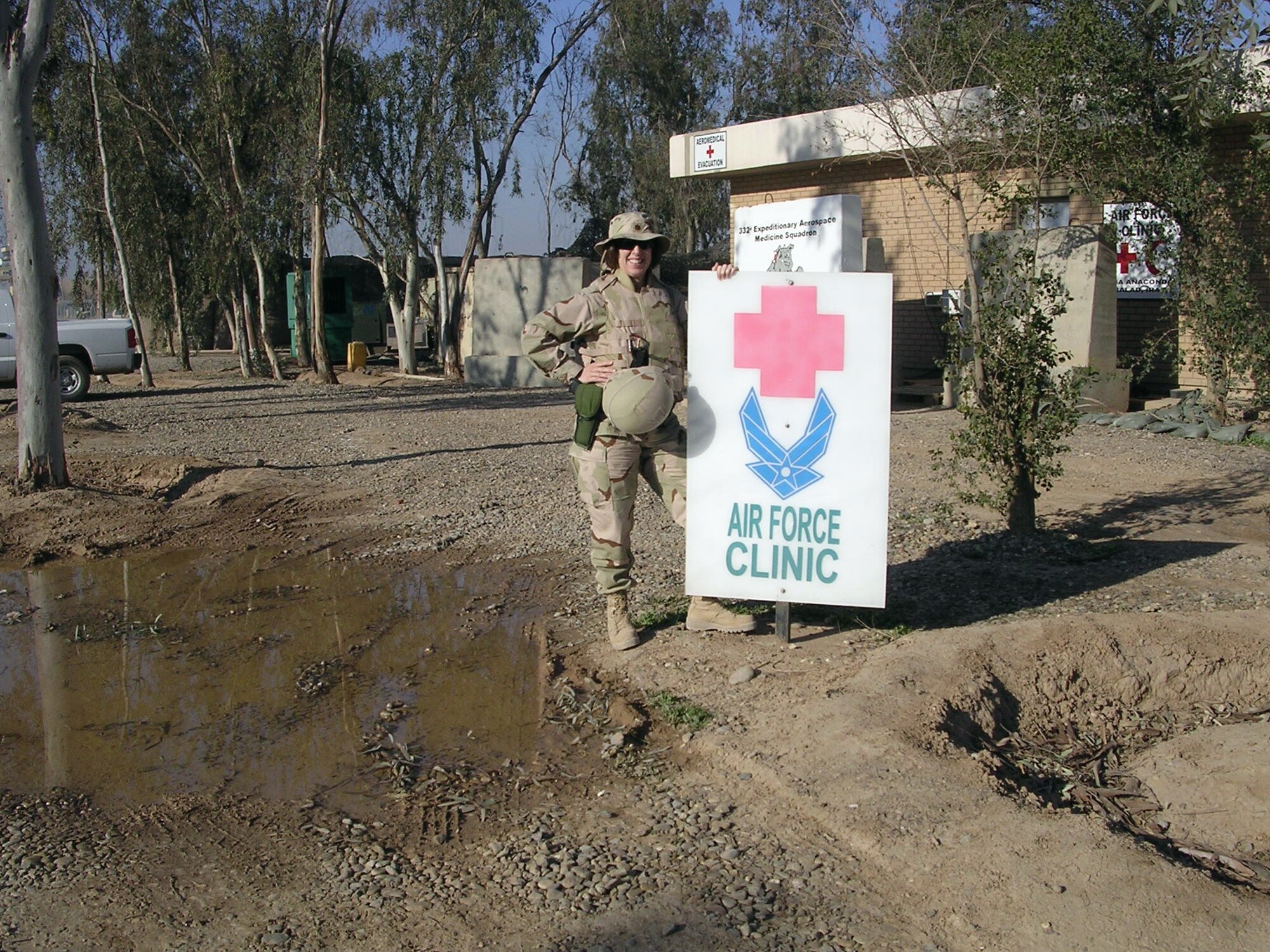 While deployed to Balad Air Base, Iraq, Maj. Marcia Potter, 436th Medical Dental Operations Squadron, served as the women's health practitioner and utilized off-duty time to treat refugee women. She was selected Sept. 19 to represent the Air Force in the DoD national civil outreach program 'Why We Serve.' (Courtesy photo)