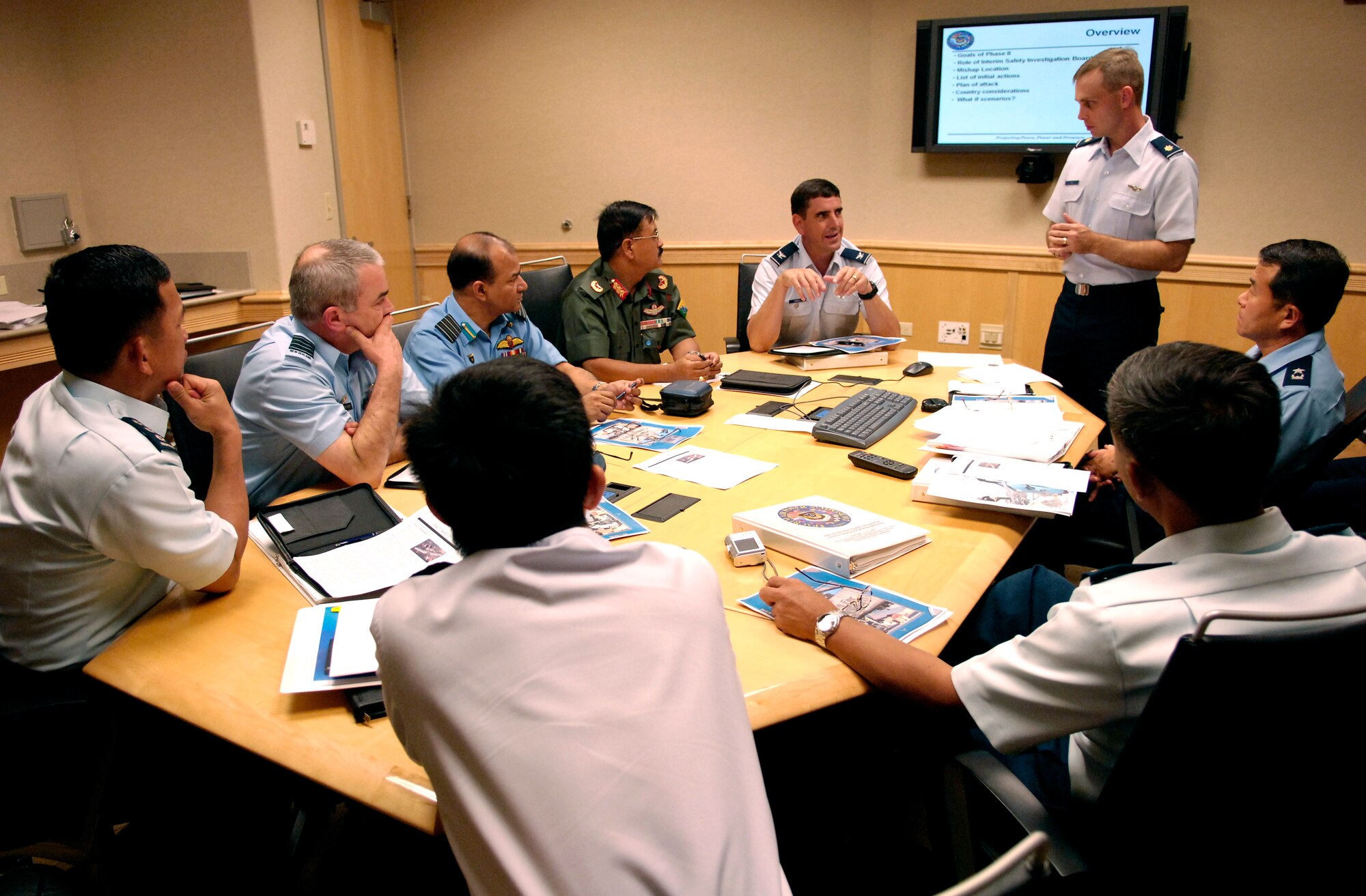 Members of the Pacific Rim Airpower Symposium discuss mishap investigation procedures Sept. 19, 2007 during a break out session at the Aloha Conference Center on Hickam Air Force Base, Hawaii. The PACRIM Symposium provides an ideal forum to communicate the value of U.S. engagement with nations of the Asia-Pacific region and our commitment to the region to internal, local, national and regional audiences. (U.S. Air Force photo/Tech. Sgt. Shane A. Cuomo)