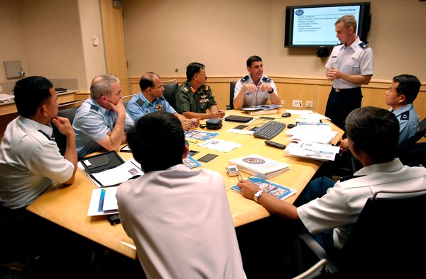 Members of the Pacific Rim Airpower Symposium discuss mishap investigation procedures Sept. 19, 2007 during a break out session at the Aloha Conference Center on Hickam Air Force Base, Hawaii. The PACRIM Symposium provides an ideal forum to communicate the value of U.S. engagement with nations of the Asia-Pacific region and our commitment to the region to internal, local, national and regional audiences. (U.S. Air Force photo/Tech. Sgt. Shane A. Cuomo)