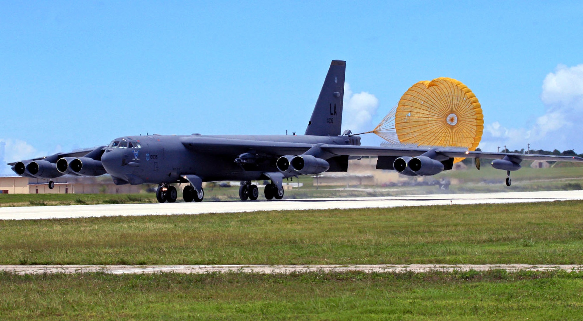 A deployed B-52 Stratofortress returns after an Exercise Koa Lightning sortie to Andersen Air Force Base, Guam. In September's Koa Lightning, B-52 aircrews dropped inert weapons on their targets for the first time. The aircraft were talked in to the targets by joint terminal air controllers on the ground. (U.S. Air Force photo/Senior Master Sgt. Mahmoud Rasouliyan) 
