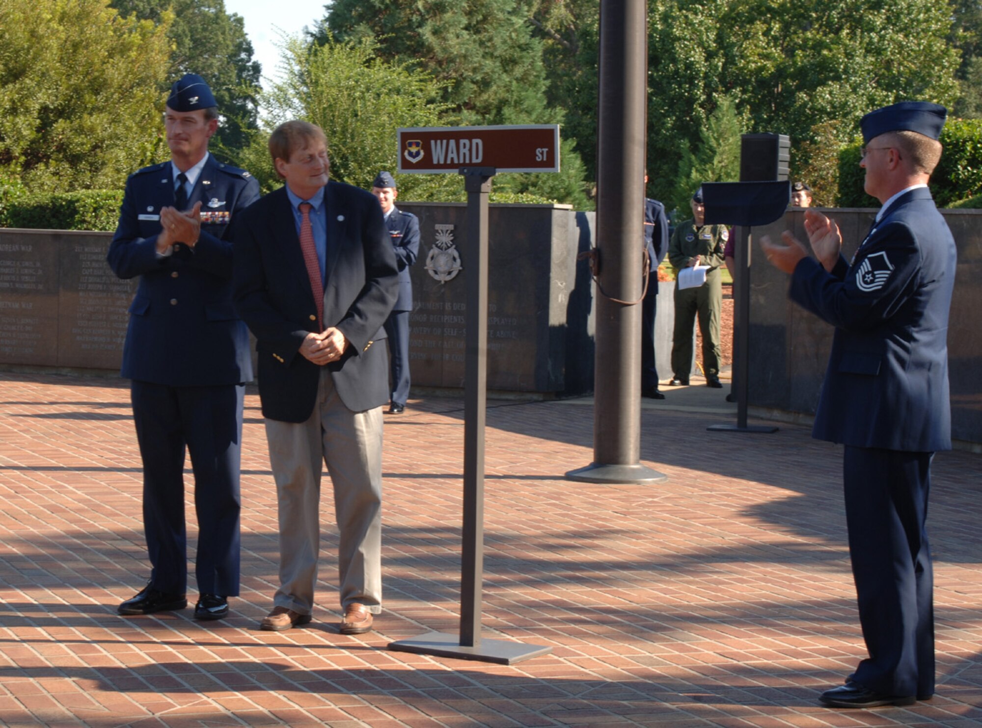 Rufus Ward Jr. reflects on the new street sign bearing his father's name at the POW/MIA ceremony.  Rufus Ward Sr., a Columbus native and B-17 tail gunner in WW II,  was a POW for 11 months after being shot down over Germany. Ward street will replace Fifth street on Columbus AFB, Miss.  (U.S. Air Force photo by Airman 1st Class Danielle Powell)
