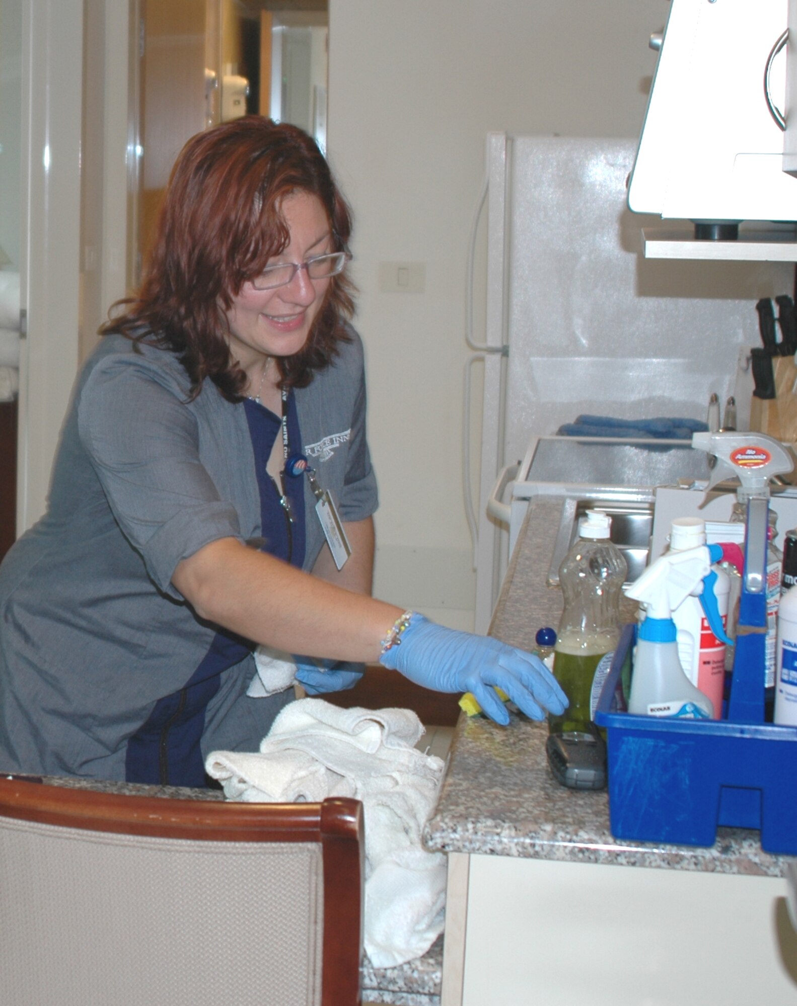 AVIANO AIR BASE, Italy--Laura Fabbro, a custodial worker at the Mountain View Lodge, cleans a room in the lodge Sept. 18. (U.S. Air Force photo by Tech. Sgt. Michael O'Connor). 