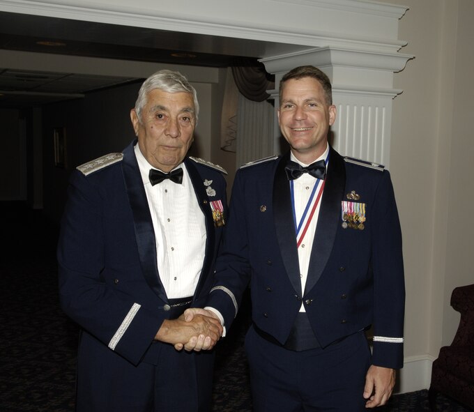 General Marquez and Colonel Johnson pause after the ceremony recognizing Colonel Johnson's receipt of the award. The two men talked about issues maintenance Airmen face today and also relayed maintenance stories of years gone by. (Courtesy photo)
