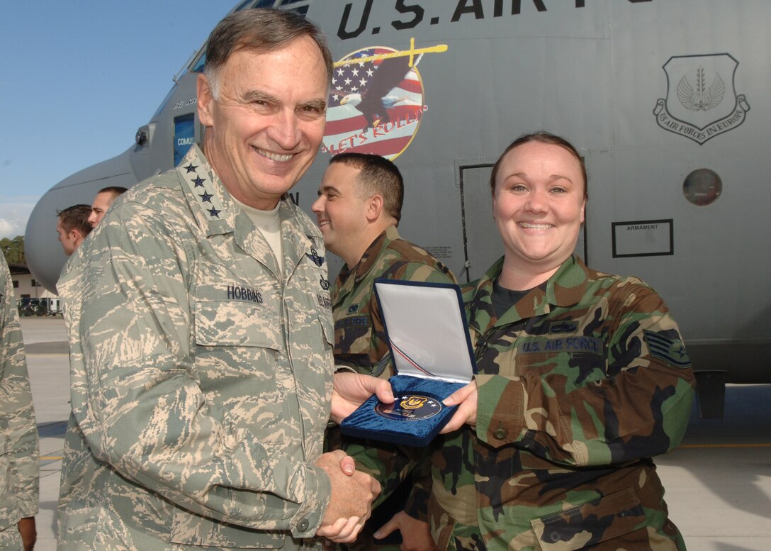 Gen. Tom Hobbins, U.S. Air Forces in Europe commander, presents Staff Sgt. Katherine Facklam, 86th Air Maintenance Squadron, crew chief, with the ACE award September 19. The 86 Maintenance Group's Maintenance Team took second of 23 at the 2007 AMC RODEO competition. (U.S. Air Force Photo by Airman 1st Class Kelly LeGuillon) 
