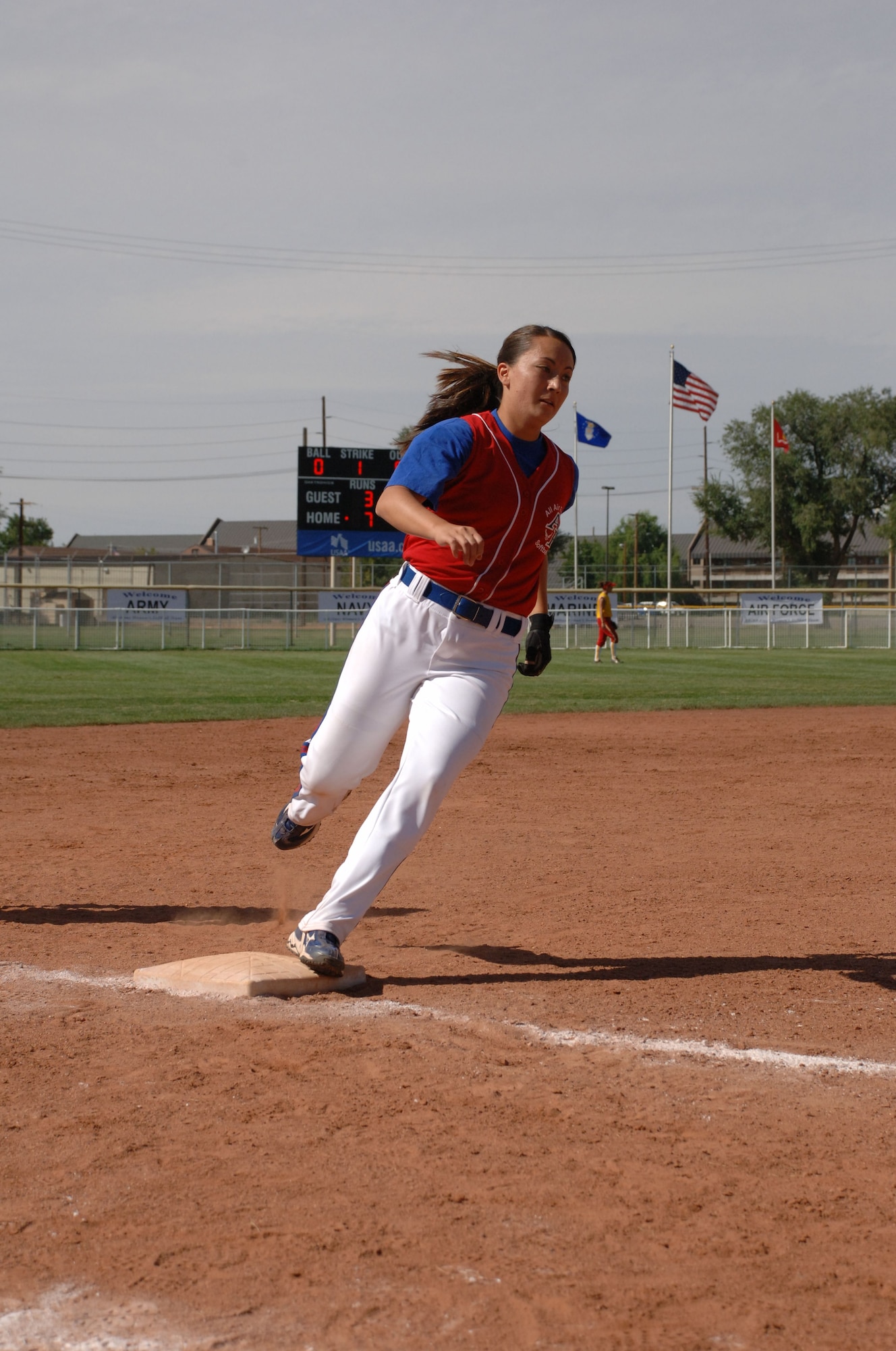 HILL AIR FORCE BASE, Utah-- Air Force 2nd Lt.  Kristina Dempsey rounds third base and looks to score in recent softball action. The All-Armed Forces Women’s Softball Championships were held at Hill Air Force Base, Utah Sept. 18-21. (U.S. Air Force photo by Alex R. Lloyd)