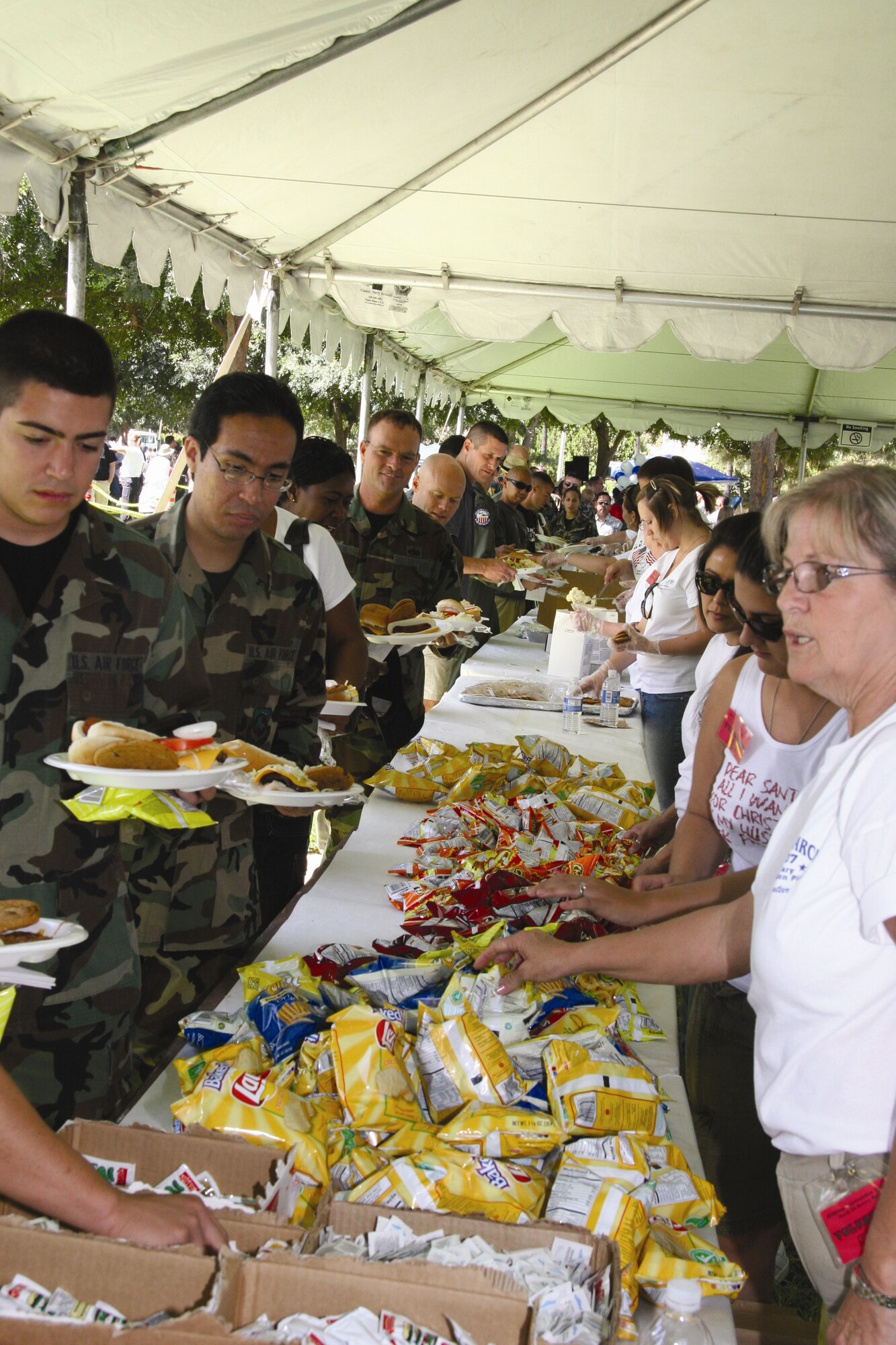 Troops and their family members were treated to a full spread during the picnic; hamburgers, hot dogs, sides, chips, dessert and a variety of beverages. The picnic is an annual event organized by the Riverside and Moreno Valley Chambers of Commerce along with the help of local volunteers.  This is their 35th year organizing the event which is free to all military members and dependents.  (U.S. Air Force photo by Senior Airman Paul Duquette)