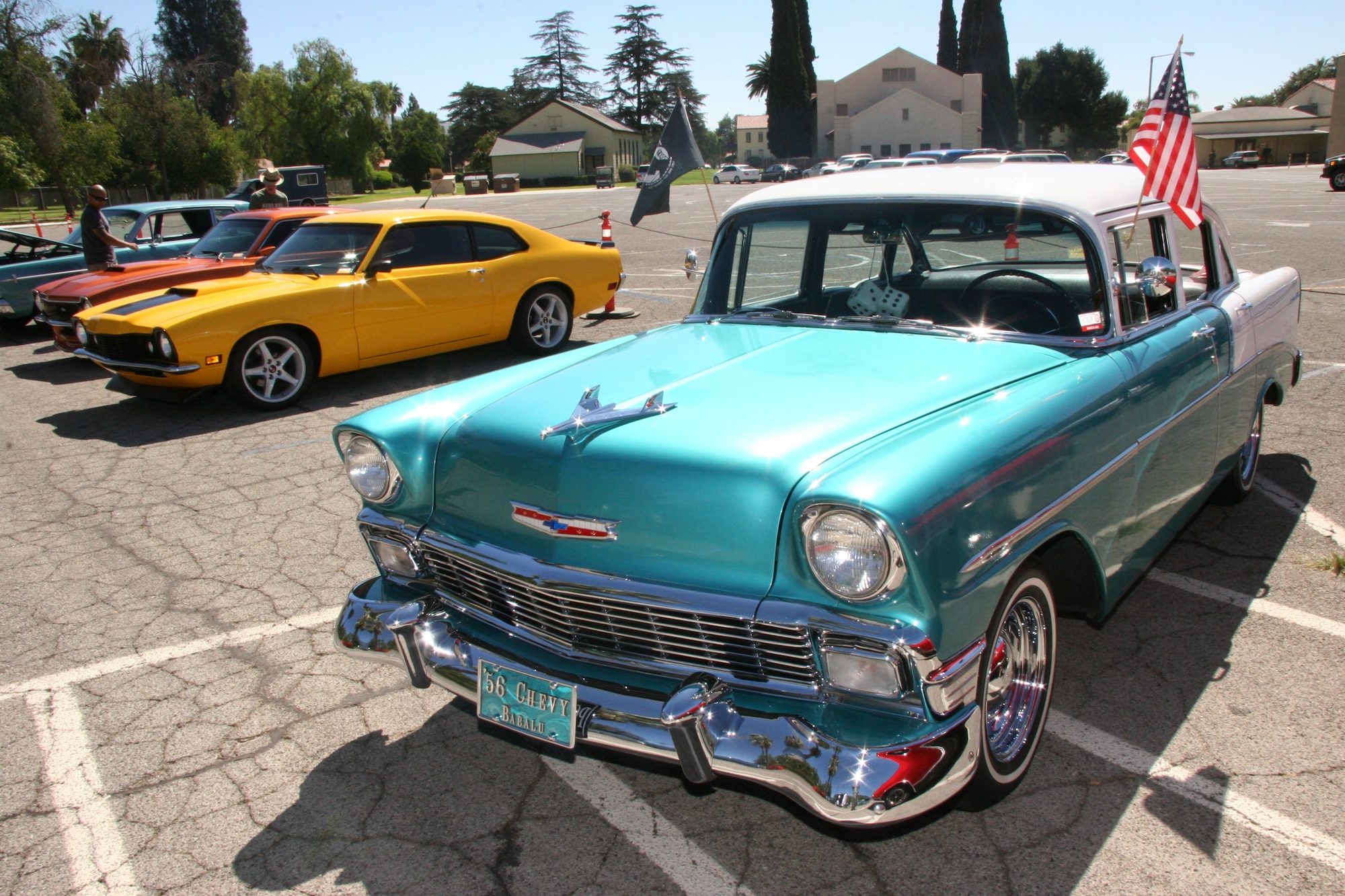 One of the many components of the picnic was the car show where a variety of vehicles lined up for inspection. The picnic had activities for everyone to include a rock-climbing wall and jumpers for the kids, a dunk tank, face painting, shaved ice, ice cream trucks and an array of booths.  (U.S. Air Force photo by Senior Airman Paul Duquette)