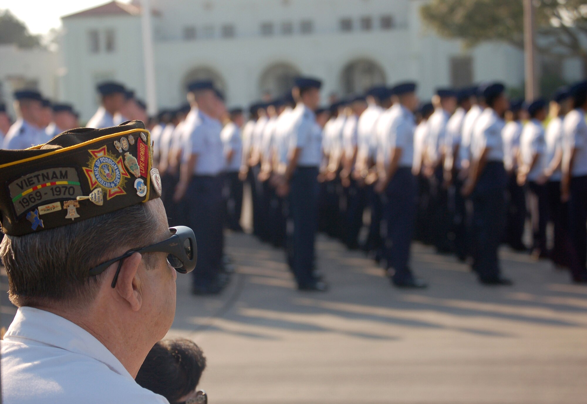 Retired Staff Sgt. Douglas Poole watches during the Prisoner of War/Missing in Action recognition ceremony held Sept. 21 at Randolph Air Force Base, Texas. The ceremony was part of National POW/MIA Recognition Day. Sergeant Poole was an Air Force heavy equipment operator. (U.S. Air Force Photo/Staff Sgt. Jeremy Larlee)