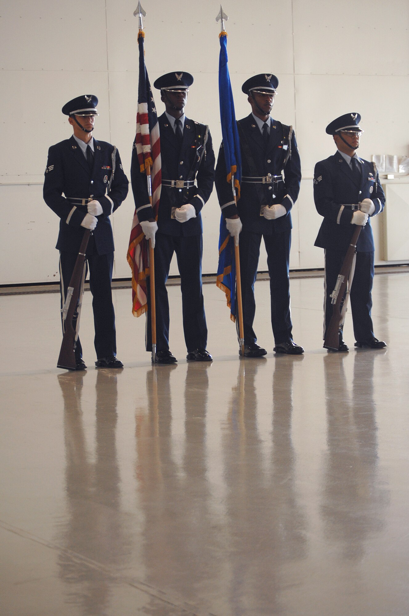 Hurlburt Field Honor Guard members stand at attention during Hurlburt's POW/MIA ceremony at the Freedom Hanger on Sept. 14, 2007. 