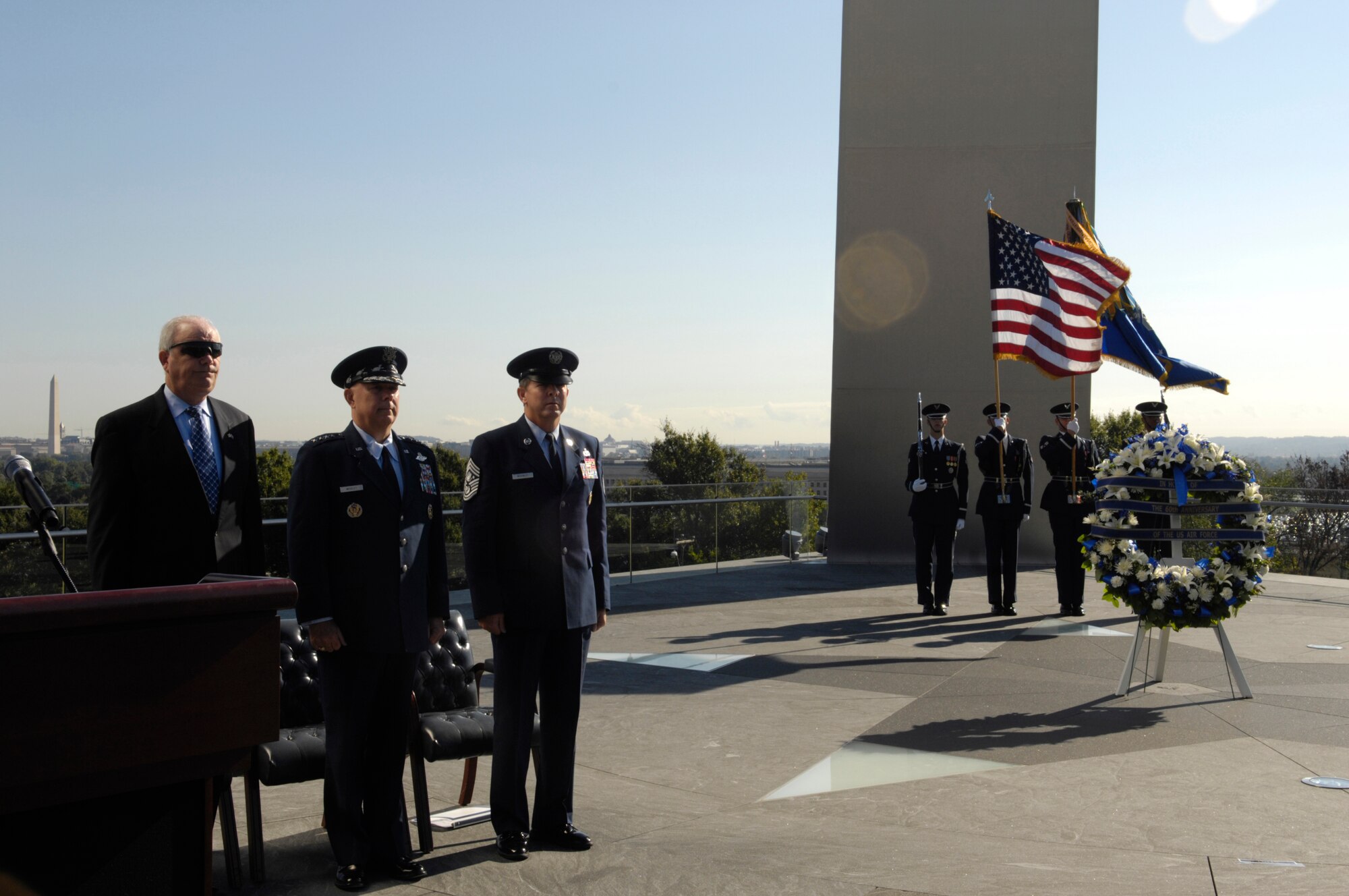 Secretary of the Air Force Michael W. Wynne, Air Force Chief of Staff Gen. T. Michael Moseley, and Chief Master Sgt. of the Air Force (CMSAF) Rodney J. McKinley host the wreath laying ceremony in honor of this years’ 60th Anniversary of the Air Force Sept. 18, at the Air Force Memorial in Washington.  Throughout the year, many bases have held their own ceremonies to celebrate its birthday.  Member’s from all over the National Capitol Region were here to celebrate this event and be apart of Air Force History. (U.S. Air Force photo by Senior Airman Rusti Caraker)(Released)