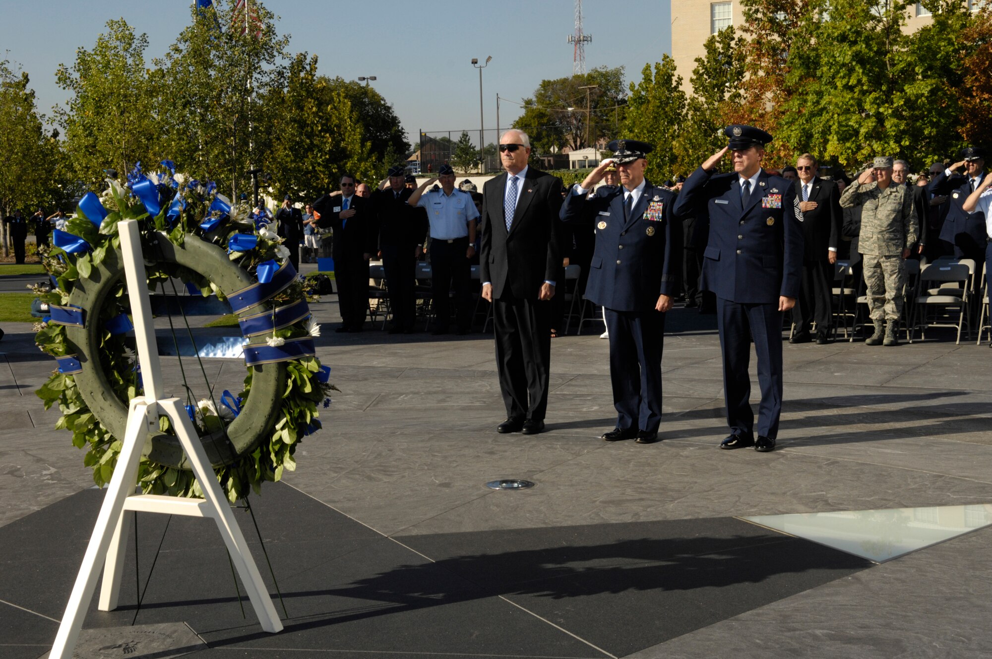 Secretary of the Air Force Michael W. Wynne, Air Force Chief of Staff Gen. T. Michael Moseley, and Chief Master Sgt. of the Air Force (CMSAF) Rodney J. McKinley pay respects to the wreath in honor of this years’ 60th Anniversary of the Air Force Sept. 18, at the Air Force Memorial in Washington.  Throughout the year, many bases have held their own ceremonies to celebrate its birthday.  Member’s from all over the National Capitol Region were here to celebrate this event and be apart of Air Force History. (U.S. Air Force photo by Senior Airman Rusti Caraker)(Released)