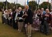 Mr. Jim Ashley, a former second lieutenant with the Army Air Corps, World War II veteran and former prisoner of war, stands with fellow POWs and their spouses during the playing of “Taps” during the POW/MIA ceremony at Memorial Park Sept. 21. (U.S. Air Force photo/Senior Airman Dawn Duman)