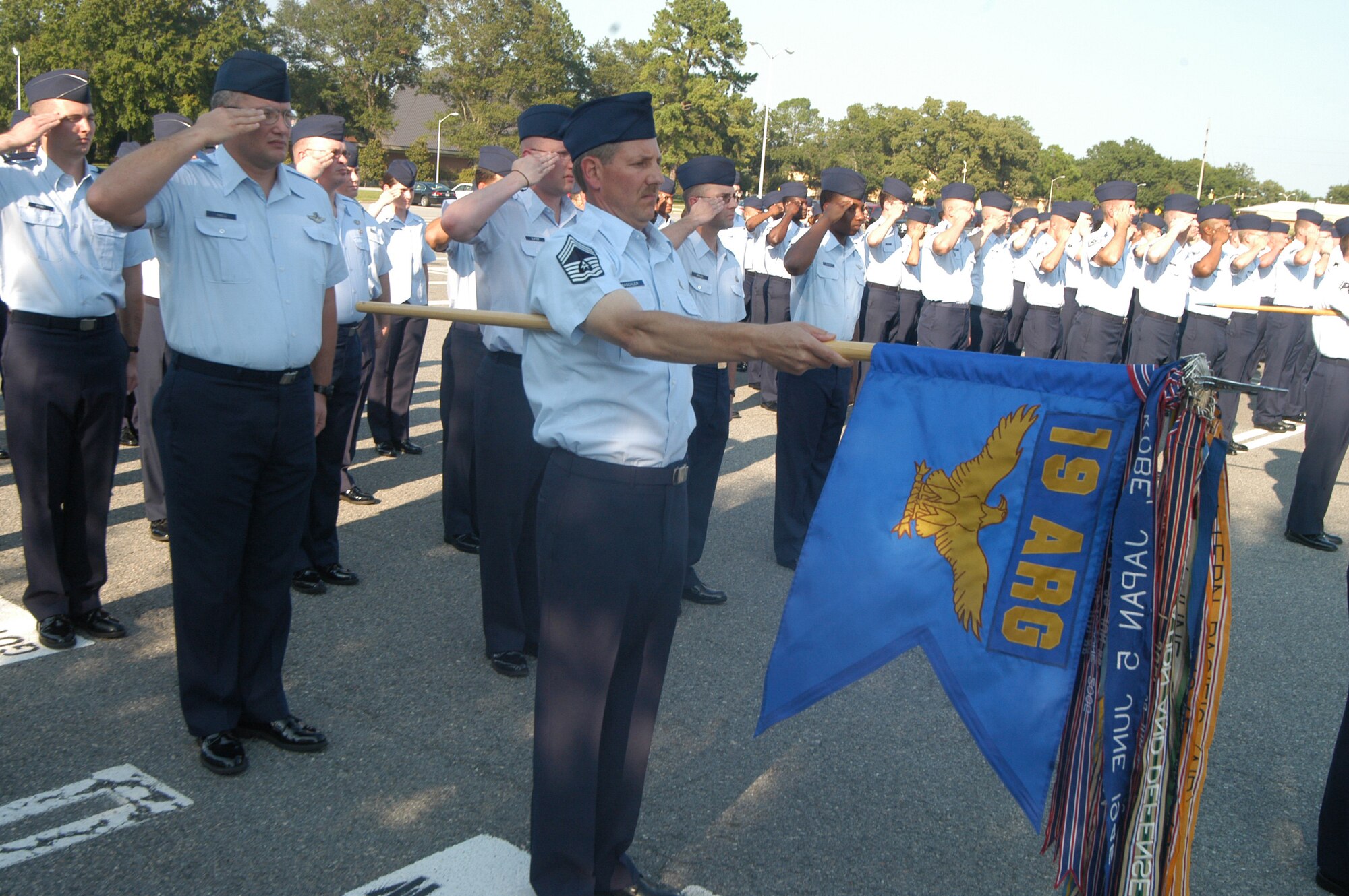 Members of the 19th Air Refueling Group present arms during the retreat ceremony. The group, which will deactivate in July 2008, was given special recognition for their role in Air Force history during the past eight decades. U.S. Air Force photo by Sue Sapp