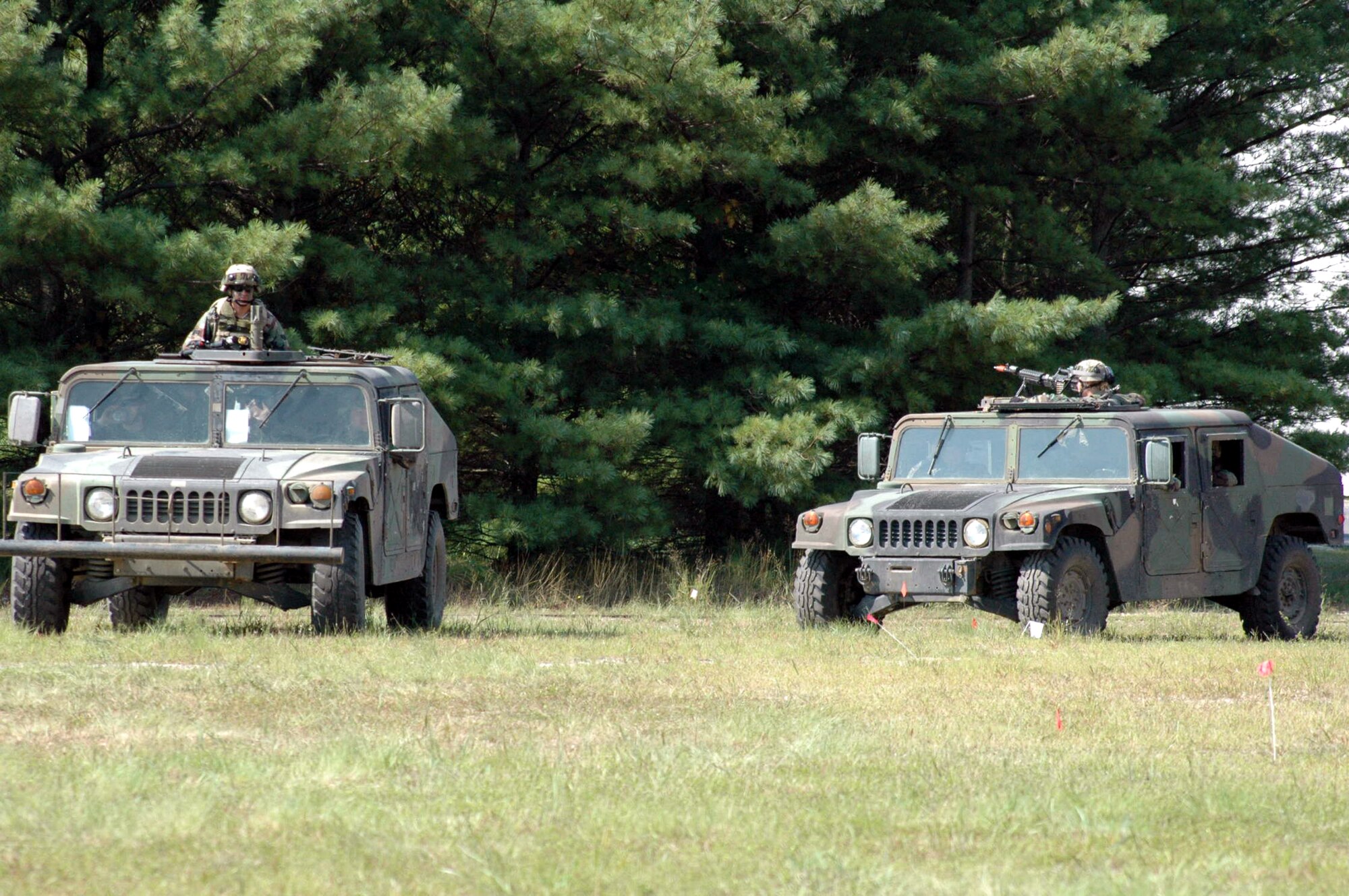 Students in the Air Force Phoenix Warrior Training Course 07-6 hold a convoy Aug. 29 at Naval Air Engineering Station Lakehurst, N.J.  The course is taught by the U.S. Air Force Expeditionary Center's 421st Combat Training Squadron at Fort Dix, N.J.  (U.S. Air Force Photo/Tech. Sgt. Scott T. Sturkol)