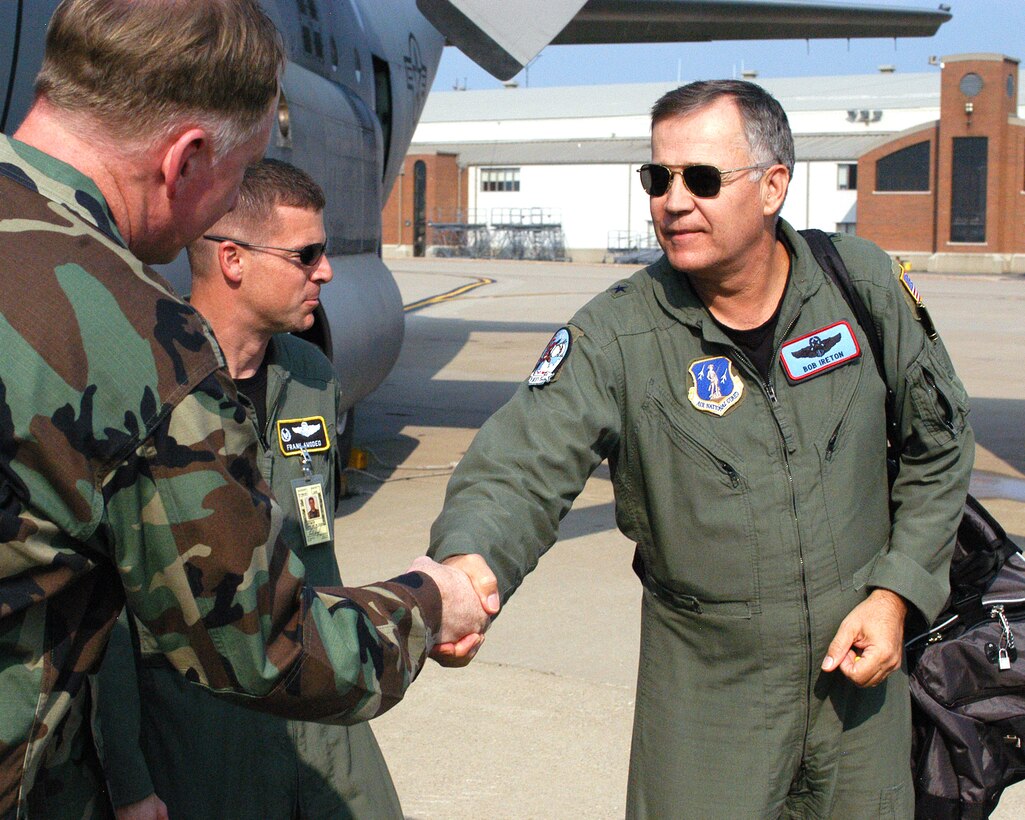PITTSBURGH AIR RESERVE STATION, Pa. -- Brigadier General Robert D. Ireton, Chief of Staff and Commander of the Oklahoma National Guard, is greeted by Col. Michael McCully, 911th Airlift Wing Mission Support Group Commander and Lt. Col. Frank Amodeo, 911 AW Operations Group Commander. Gen. Ireton arrived at Pittsburgh Air Reserve with members of the 137th Airlift Wing delivering three C-130H2 Hercules Aircraft to the 911th AW. The 137th is in the process of restructuring to a refueling wing.  (AF photo by Staff Sgt. Ian Carrier)                            