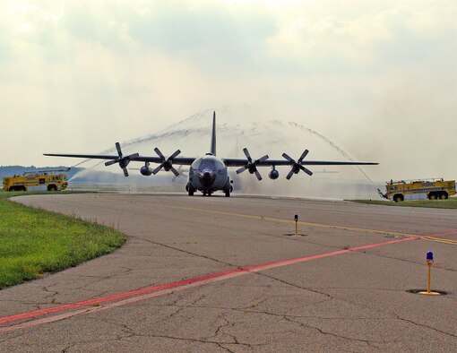 PITTSBURGH AIR RESERVE STATION, Pa -- The first of the last three C-130H2 Hercules aircraft from the 137th Airlift Wing, Oklahoma Air National Guard receive a wattery reception at Pittsburgh Air Reserve Station Sep. 20, 2007. Members of the 137th and Brigadier General Robert D. Ireton, Chief of Staff and Commander of the Oklahoma National Guard, delivered the last of their C-130's to the 911th Airlift Wing. The 137th will be converting to a refueling wing utilizing C-135 Stratotankers. The flight to Pittsburgh was the final C-130 flight for the 137th before their changeover, and for most crewmembers their last ever flight in a Hercules. (AF photo by Staff Sgt. Ian Carrier)                                