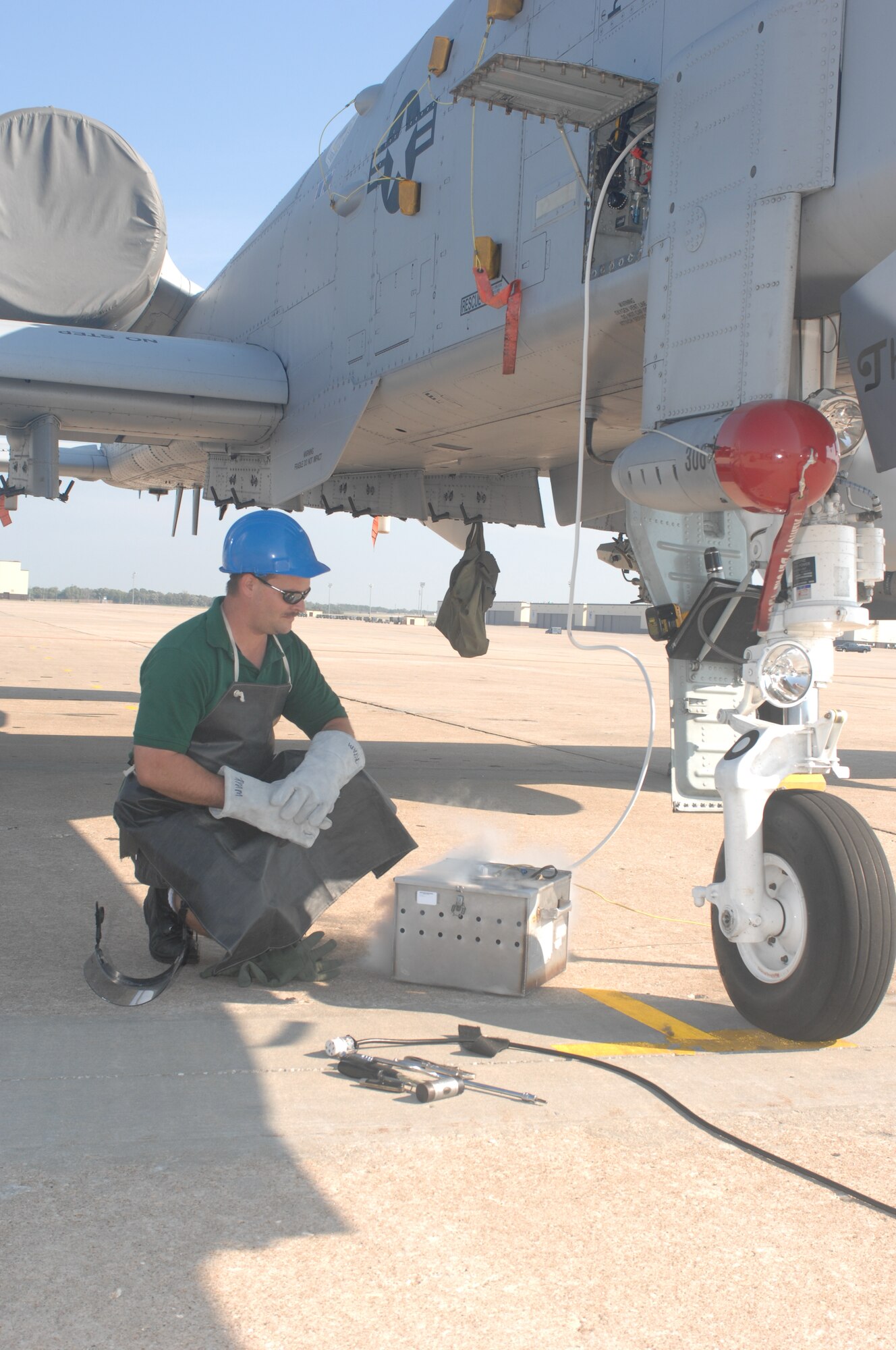 WHITEMAN AIR FORCE BASE, Mo. -- Tech. Sgt. Adam Martin, 442d Aircraft Maintenance Squadron, purges the liquid oxygen system on A-10 aircraft Sept. 17. The system provides oxygen for the pilot to prevent hypoxia or oxygen starvation. (U.S. Air Force photo/Tech. Sgt. Samuel A. Park) 