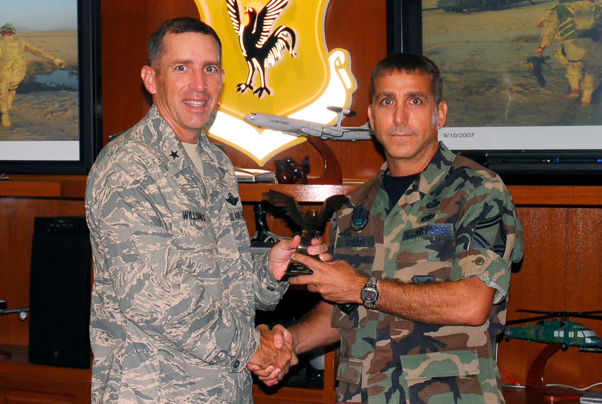 Senior Master Sgt. Todd Staats, 18th Maintenance Operations Squadron, receives his Air Force-level award from Brig. Gen. Brett Williams, 18th Wing commander, Sept. 10, 2007. (U.S. Air Force photo/Airman 1st Class Sheila deVera)
