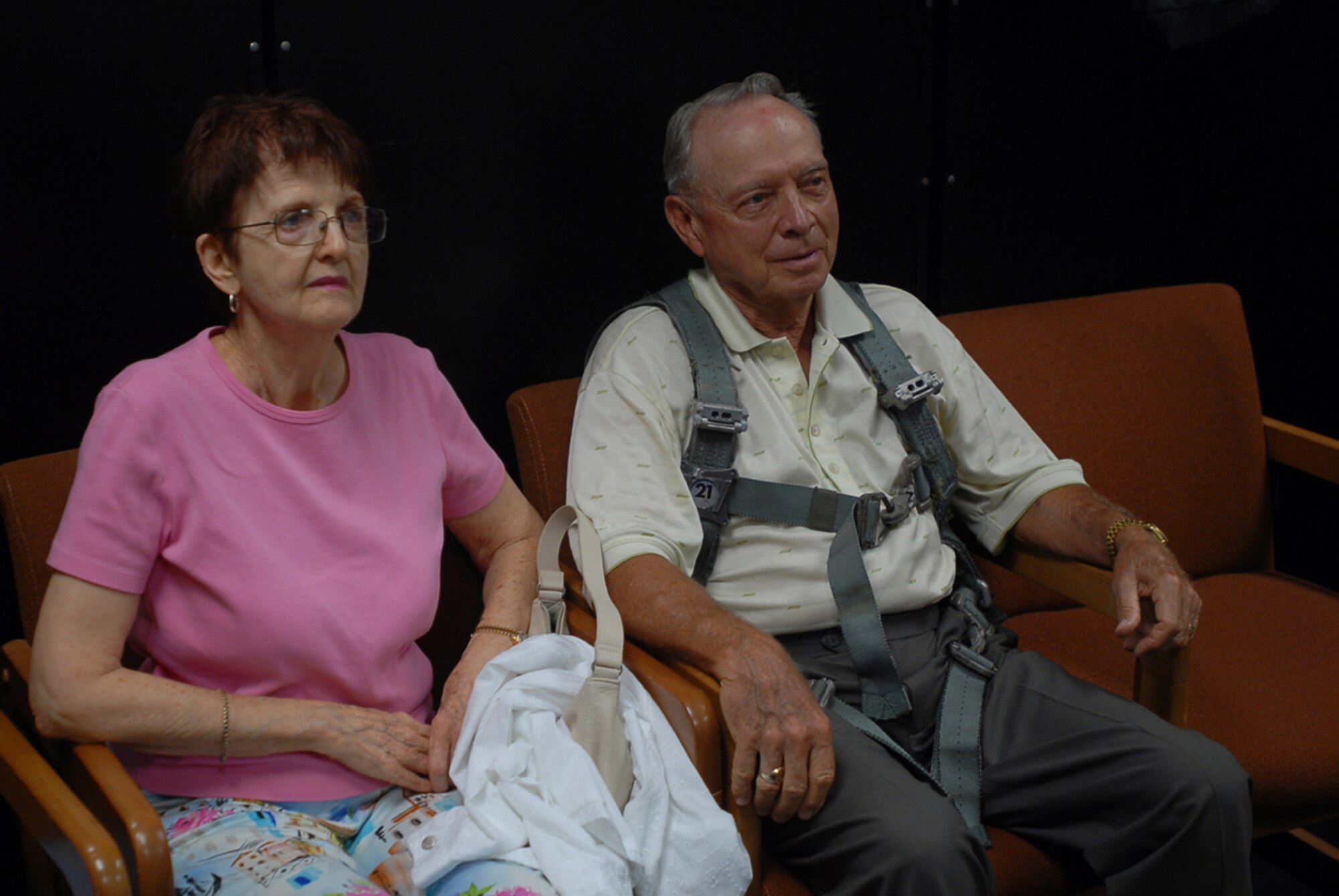Col. (ret.) and former Prisoner of War Jim Lamar and his wife Judy Lamar listen to emergency procedures  at Kadnea Air Base, Japan, Sept. 20, 2007. Mr. Lamar was a POW during Vietnam and will be speaking at the base's POW/MIA ceremony Sept. 21.  After the ceremony, Mr. Lamar will receive an F-15C Eagle orientation flight. (U.S. Air Force photo/Senior Airman Darnell T. Cannady)