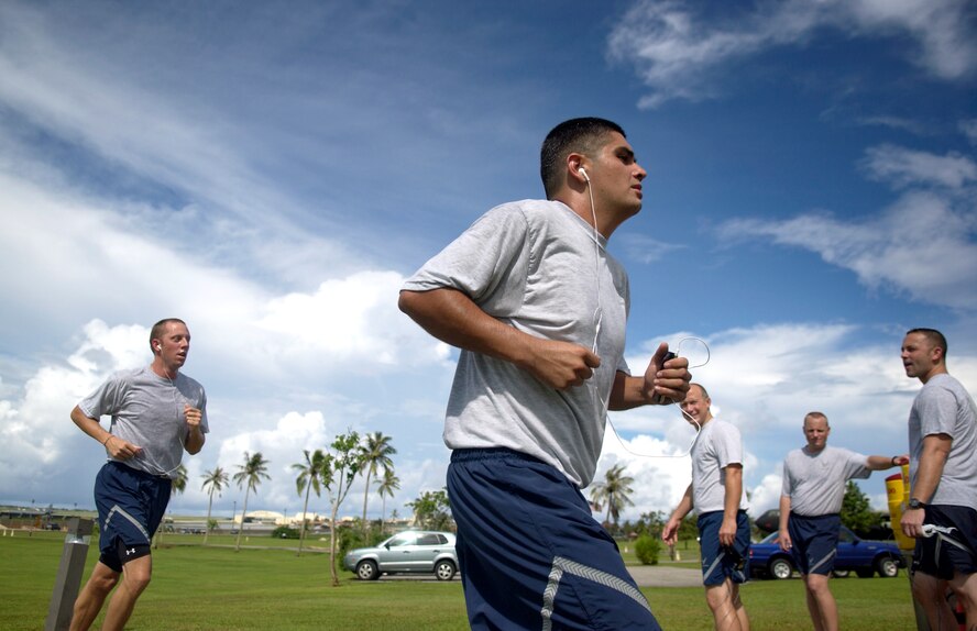 ANDERSEN AIR FORCE BASE, Guam -- Members of the 36th Expeditionary Aircraft Maintenance Squadron run around the Arc Light Memorial during the Prisoner of War and Missing in Action Run, Sept. 21, 2007. Squadrons base-wide participated in the 24-hour run on POW/MIA Recognition Day. (U.S. Air Force photo/Senior Airman Miranda Moorer)      