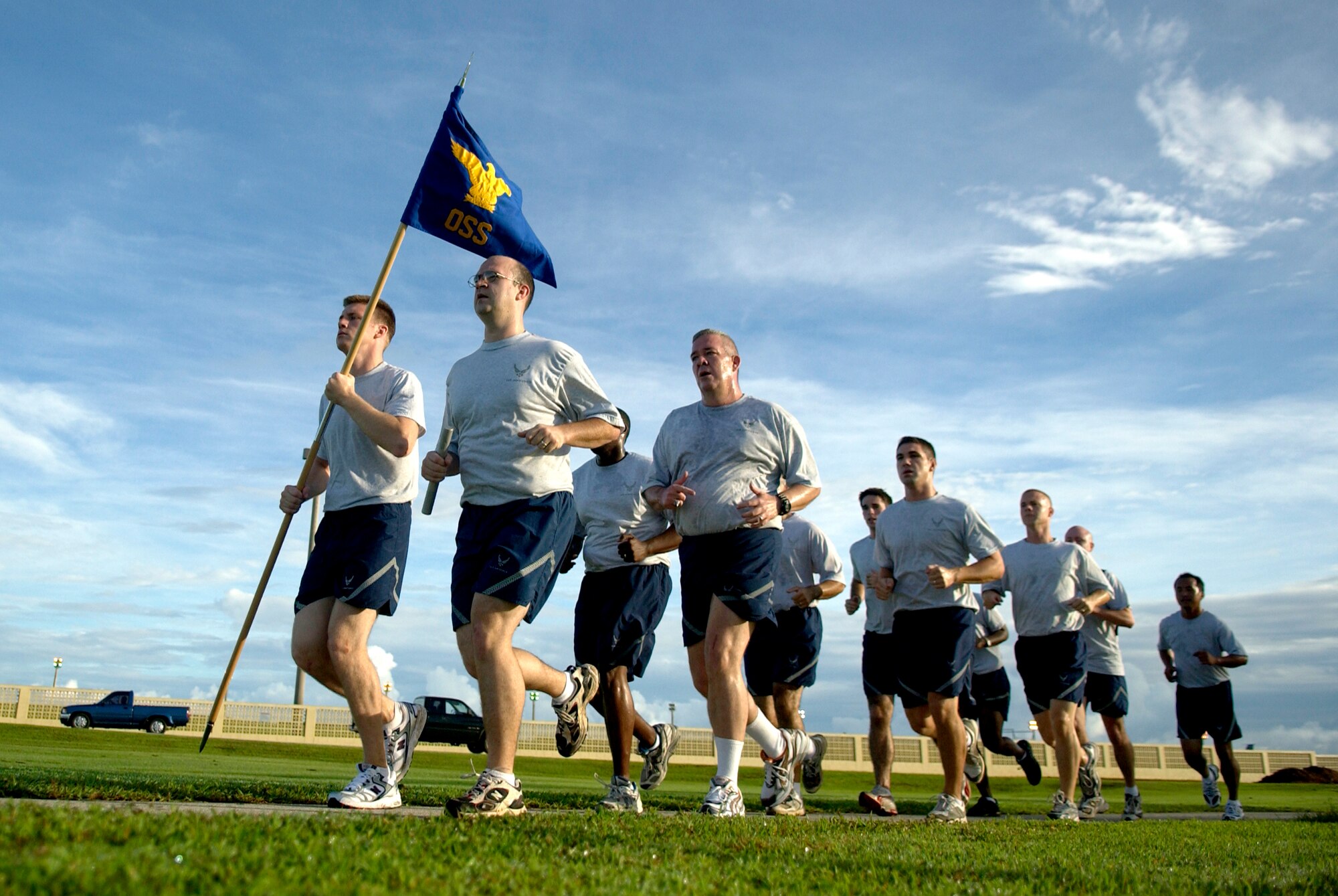 Members of the 36th Operations Support Squadron run in formation around the Arc Light Memorial during the Prisoner of War and Missing in Action Run, Sept. 21, 2007. Squadrons base-wide participated in the 24-hour run on POW/MIA Recognition Day. (U.S. Air Force photo/Senior Airman Miranda Moorer)                                