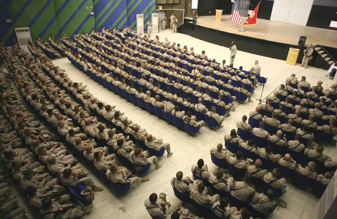 AL ASAD, Iraq- Sgt. Maj. of the Marine Corps Carlton W. Kent held a town hall meeting with Marines to discuss upcoming policy changes, Sept. 24.  Kent discussed new policies such as the wearing of the new physical training uniform out in town instead of the digital camouflage uniform.