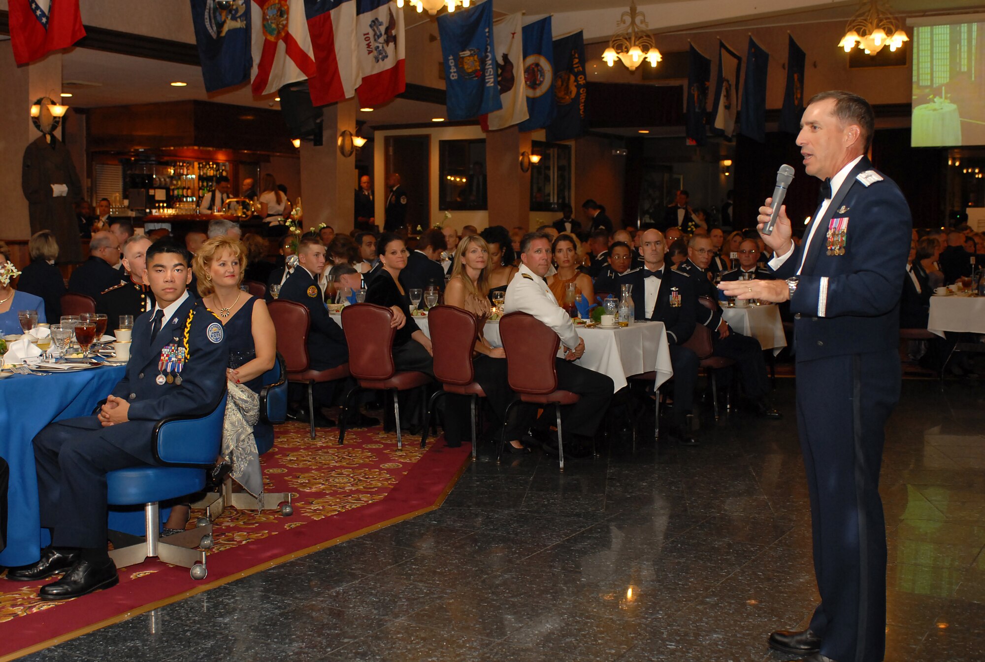 Brig. Gen. Brett T. Williams welcomes everyone to the Air Force's 60th Anniversary Ball at Kadena Air Base, Japan, Sept. 22, 2007.  The evening consisted of toasts, video presentations, guest speakers, skits and live music.  More than 800 military members and their guests from all four services, the local community and Japanese Self Defense Force attended the annual event. General Williams is the 18th Wing commander. (U.S. Air Force photo by Airman 1st Class Kelly Timney)