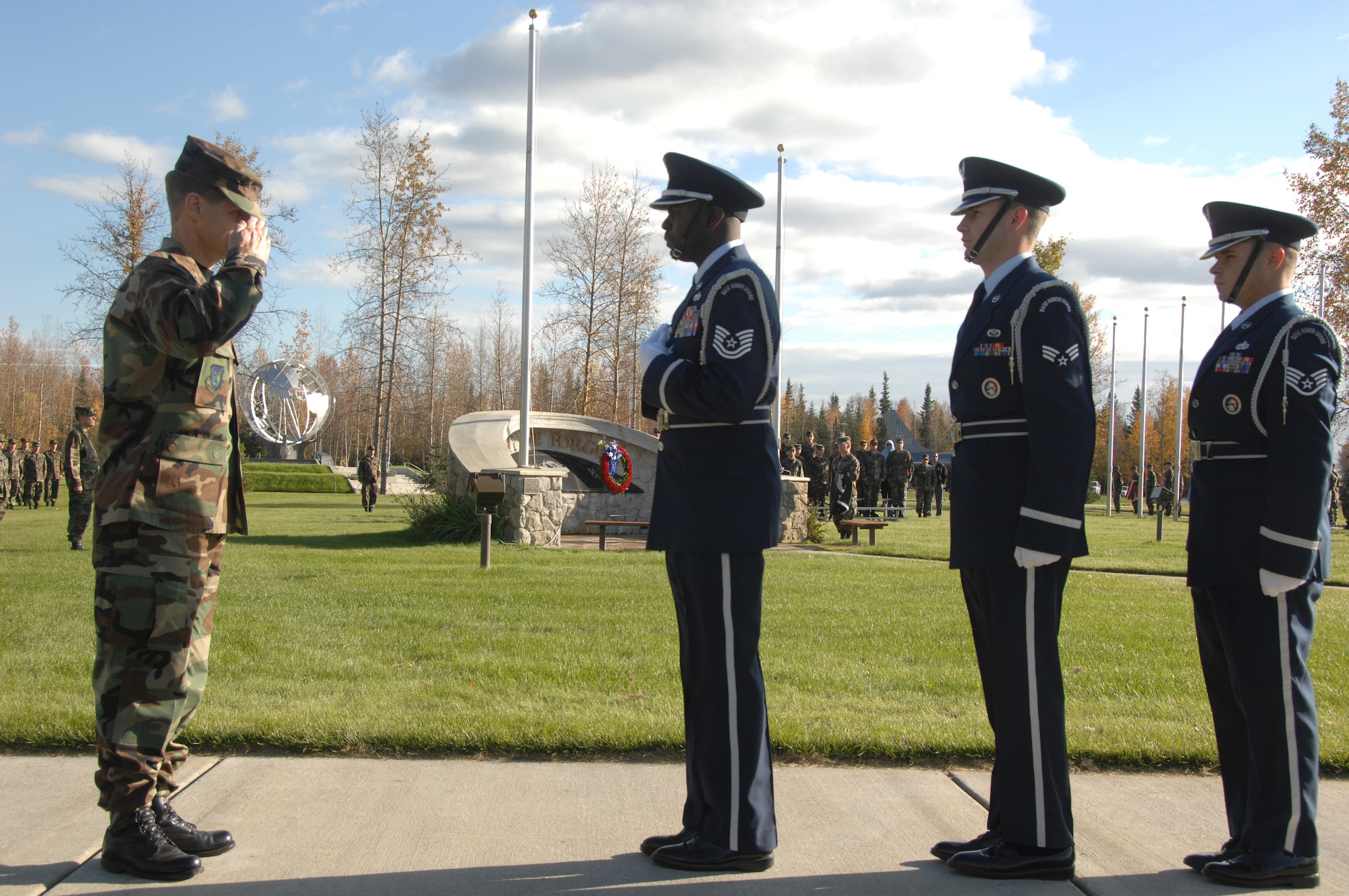 EIELSON AIR FORCE BASE, Alaska -  Brig. Gen. Mark Graper, 354th Fighter Wing commander, salutes the American flag presented by the base honor guard during the Prisoner of War and Missing in Action (POW/MIA) Recognition Day retreat ceremony at Heritage Park on September 21, 2007. The ceremony was a base-wide function honoring all POW/MIA. Observances of National POW/MIA Recognition Day are held across the country on military installations, ships at sea, state capitols, schools and veterans' facilities. This observance is one of six days throughout the year that Congress has mandated the flying of the National League of Families' POW/MIA flag. (U.S. Air Force photo by Airman 1st Class Christopher Griffin)