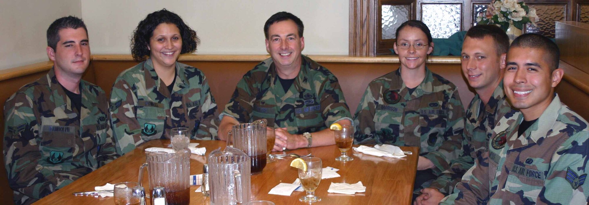 Col. Jim Eilers, 72nd Mission Support Group commander, center, enjoys lunch with Airmen in his group. With the colonel are, from left, Airman 1st Class Jeremy Randolph, 72nd Mission Support Squadron; Airman 1st Class Ericka Powell, 72nd MSS; Airman 1st Class Stephanie Harrision, 72nd MSG Logistics Readiness Division; Senior Airman Waylon Burrow, 72nd MSG/LRD’ and Senior Airman Hector Campos, 72nd Contracting Squadron. The Tinker Club has a fun program called “Bring an Airman to Lunch” in which a member in leadership brings an Airman to lunch to discuss the club, Services and the history of it all. Best of all, the Airman eats free. (Air Force photo by Kimberly Woodruff)