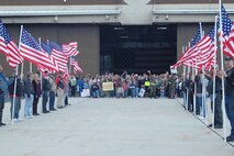 Friends and family members wait on the flightline as the Patriot Guard Riders line up for the arrival home of the 729th Air Control Squadron Sept. 23 at 11 a.m.