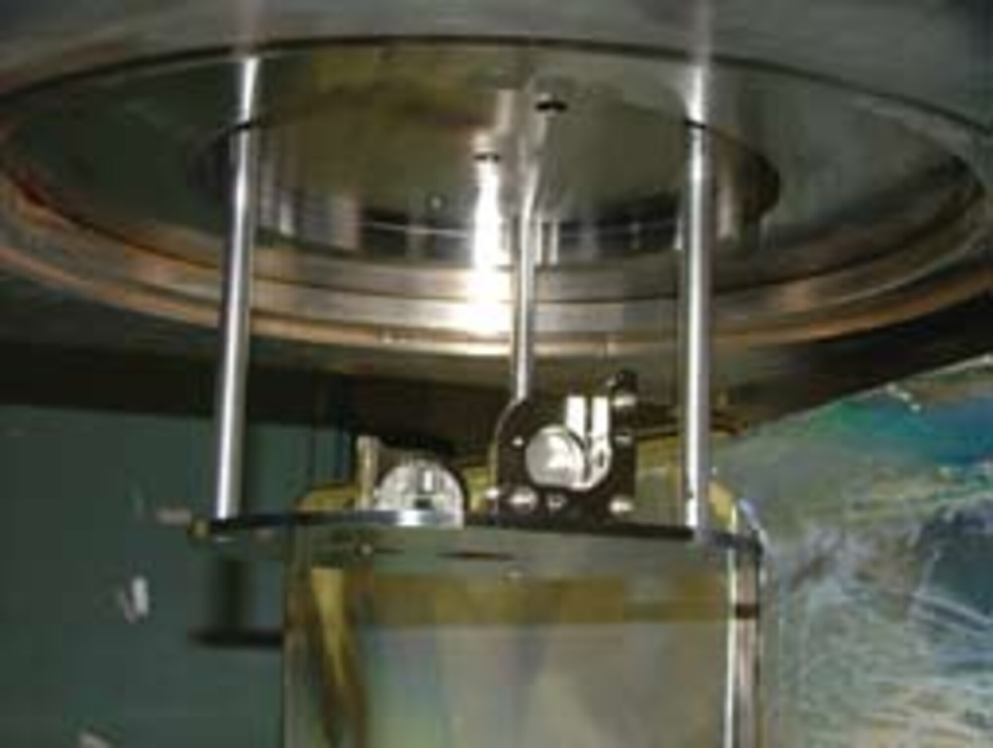 Intrachamber instrument mounted inside a vacuum chamber