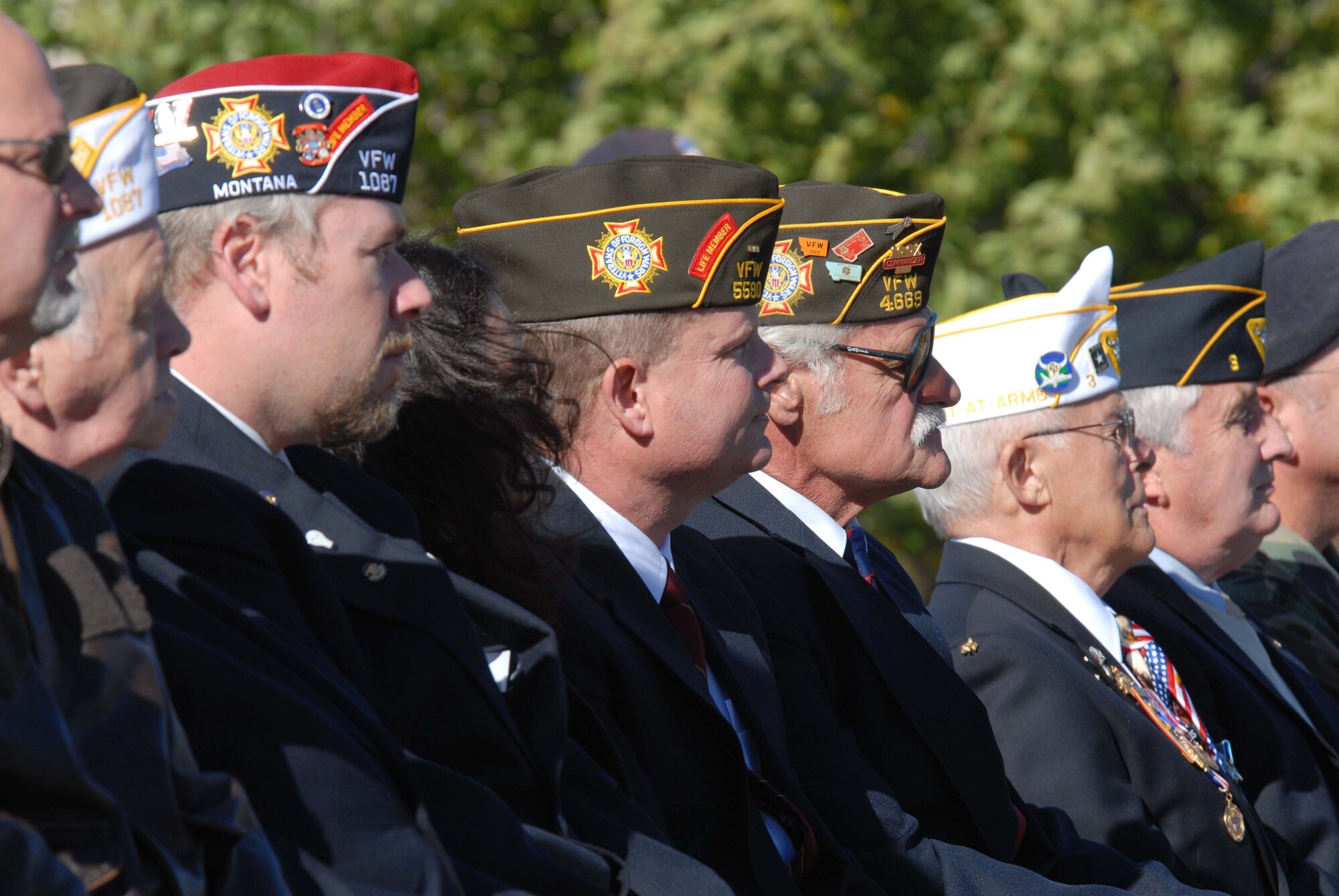 Great Falls military veterans listen intently to the message being delivered by Col. Sandy Finan, 341st Space Wing commander, at the start of the POW/MIA Remembrance Ceremony Sept. 21. The event took place at Medal of Honor Park. (U.S. Air Force photo/John Turner)