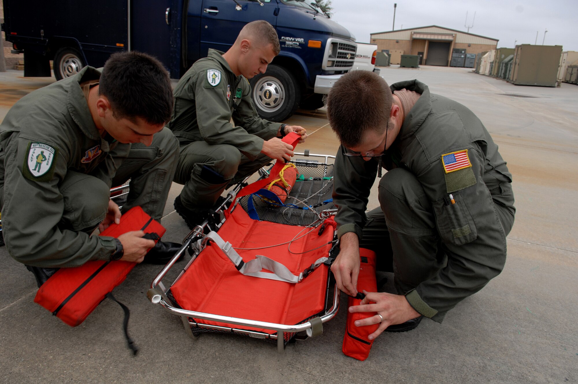 Moody Airmen prepare a litter for a real-world mission Sept. 20. Three Moody aircraft from the 23rd Wing supported the rescue mission in the Gulf of Mexico, rescuing one individual. (U.S. Air Force photo by Airman 1st Class Brittany Barker) 