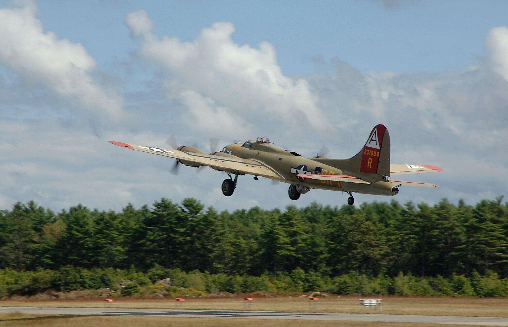 Electronic Systems Center Commander Lt. Gen. Chuck Johnson takes a ride from Plymouth Municipal Airport, Plymouth, Mass., to Laconia Municipal Airport in New Hampshire on a B-17G Flying Fortress Monday as part of the Collings Foundation’s “Wings of Freedom Tour.” For more information on the “Wings of Freedom Tour,” visit www.collingsfoundation.org. (U.S. Air Force photo by Jan Abate.)