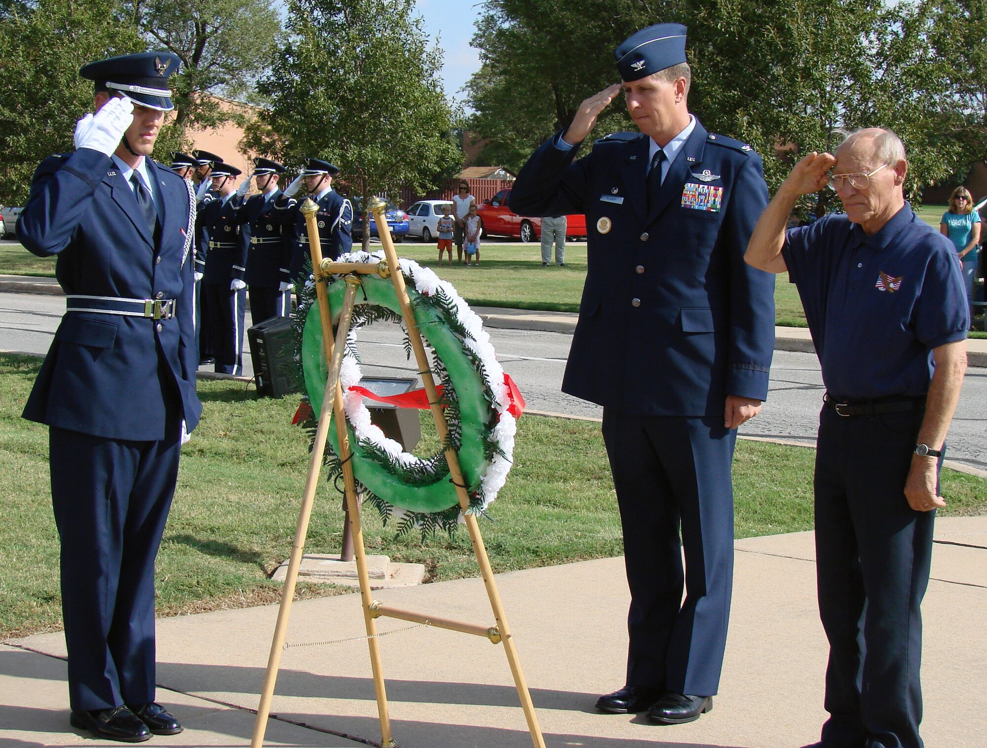 Col. Richard Klumpp, Jr., 71st Flying Training Wing commander, and Fran Hoad, an Enid resident and World War II prisoner of war, laid a wreath at the base of the flagpole and saluted during the playing of Taps Friday at the Vance 2007 POW/MIA retreat ceremony.  Mr. Hoad spent 13 months in a German prison camp after his B-17 aircraft was shot down by 105mm guns over Belgium April 10, 1944.  A group of T-38s from the 25th Flying Training Squadron flew over the gathering in a “missing man” formation to symbolize fallen comrades. POW/MIA Recognition Day was established in 1979 to honor prisoners of war who returned home, as well as those still missing in action.(U.S. Air Force photo by Capt. Tony Wickman)