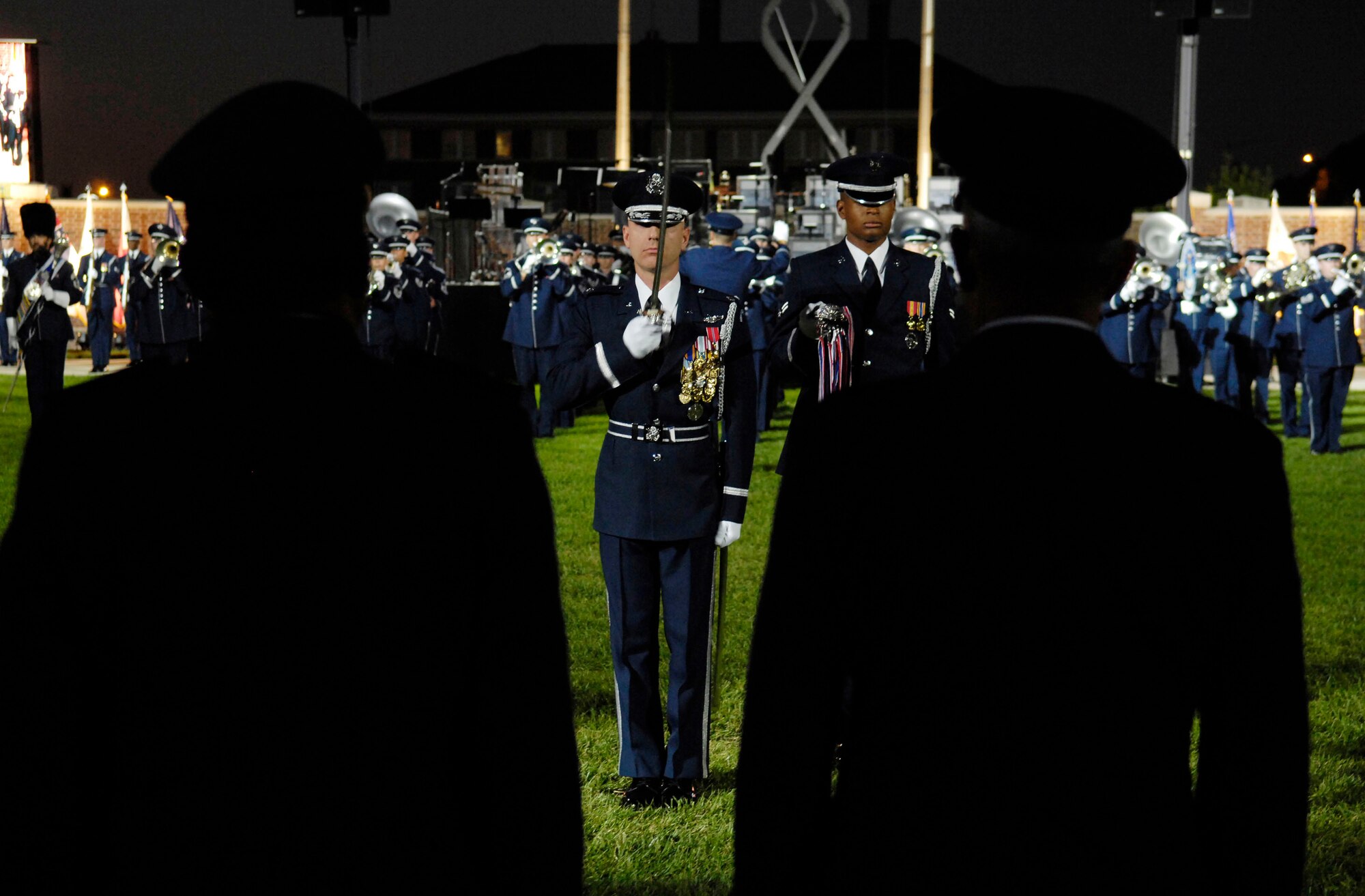 Lt. Col. Todd Taylor salutes the reviewing officials during the 2007 Air Force Tattoo Sept. 23 at Bolling Air Force Base, D.C. The 2007 Air Force Tattoo, titled "Heritage to Horizons: Commemorating 60 Years of Air and Space Power," was held on the Ceremonial Lawn on Bolling AFB for more than 100 air force leaders worldwide. Gen. Duncan J. McNabb, the Air Force vice chief of staff, hosted the event that was part of this year's Global Air Chiefs Conference. Colonel Taylor is the commander of troops. (U.S. Air Force photo/Senior Airman Daniel R. DeCook)
