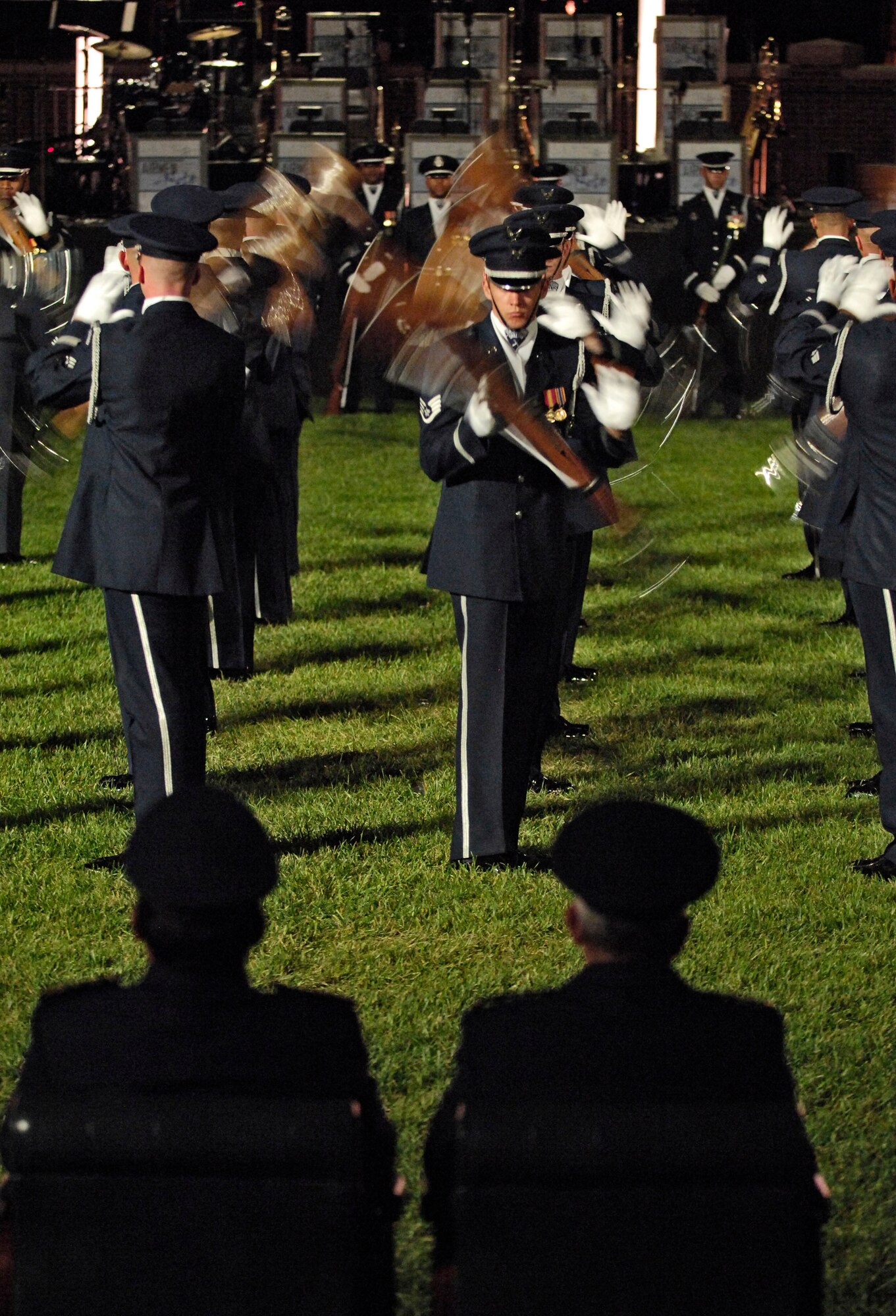 Members of the Air Force Honor Guard's Drill Team perform during the 2007 Air Force Tattoo Sept. 23 at Bolling Air Force Base, D.C. The 2007 Air Force Tattoo, titled "Heritage to Horizons: Commemorating 60 Years of Air and Space Power," was held on the Ceremonial Lawn on Bolling AFB for more than 100 air force leaders worldwide. Gen. Duncan J. McNabb, the Air Force vice chief of staff, hosted the event that was part of this year's Global Air Chiefs Conference. (U.S. Air Force photo/Senior Airman Daniel R. DeCook)
