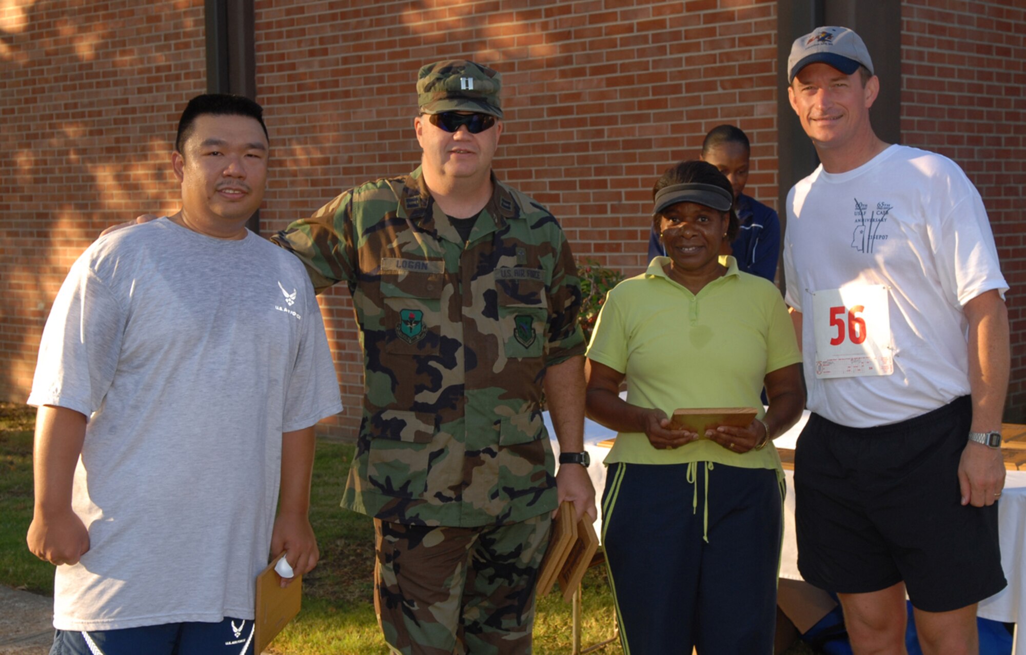 Logan's Heroes took home first prize in the Amazing Race in the non-competitive category. Tech. Sgt. Floyd Recto, Capt. (Ch) William Logan and Ida Hall, team captain, are seen here with Col. Dave Gerber, 14th Flying Training Wing commander. Other members of the team include Veronica Hackler and Cely Recto. The team also took home the prize for the most miles recorded during the race, with 1,460 miles. (U.S. Air Force photo)
