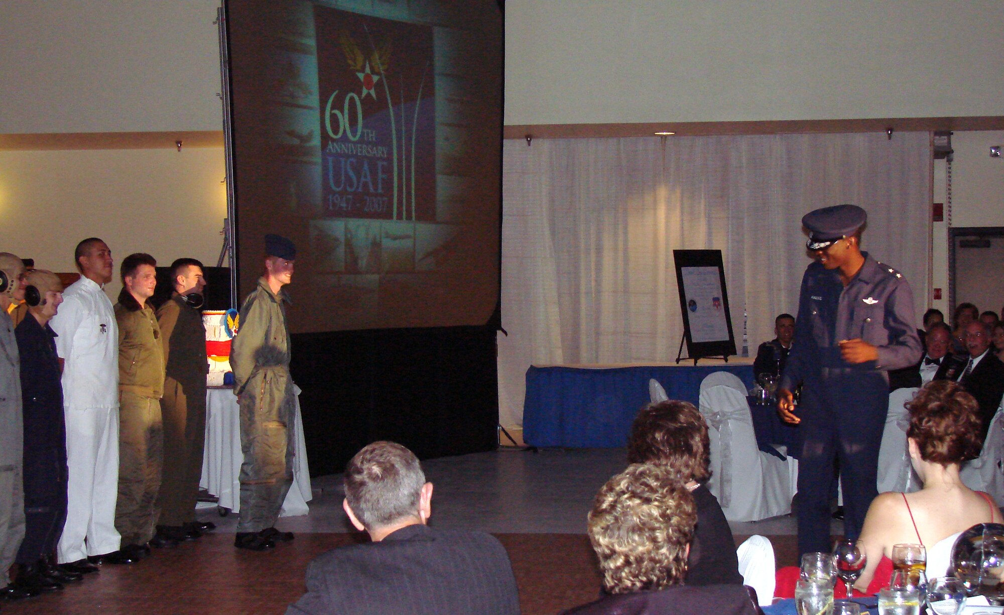 A Team Vance member models a flight suit that belonged to Maj. Gen. Donald Marks when he commanded Strategic Air Command’s 42nd Air Division during the parade of uniform during the Air Force 60th birthday celebration Saturday night at Cherokee Strip Conference Center. More than 390 attendees were treated to rousing tributes to the Air Force and Oklahoma, dining and dancing and a guest speech by Maj. Gen Irv Halter, 19th Air Force commander. (Air Force photo by Capt. Tony Wickman)