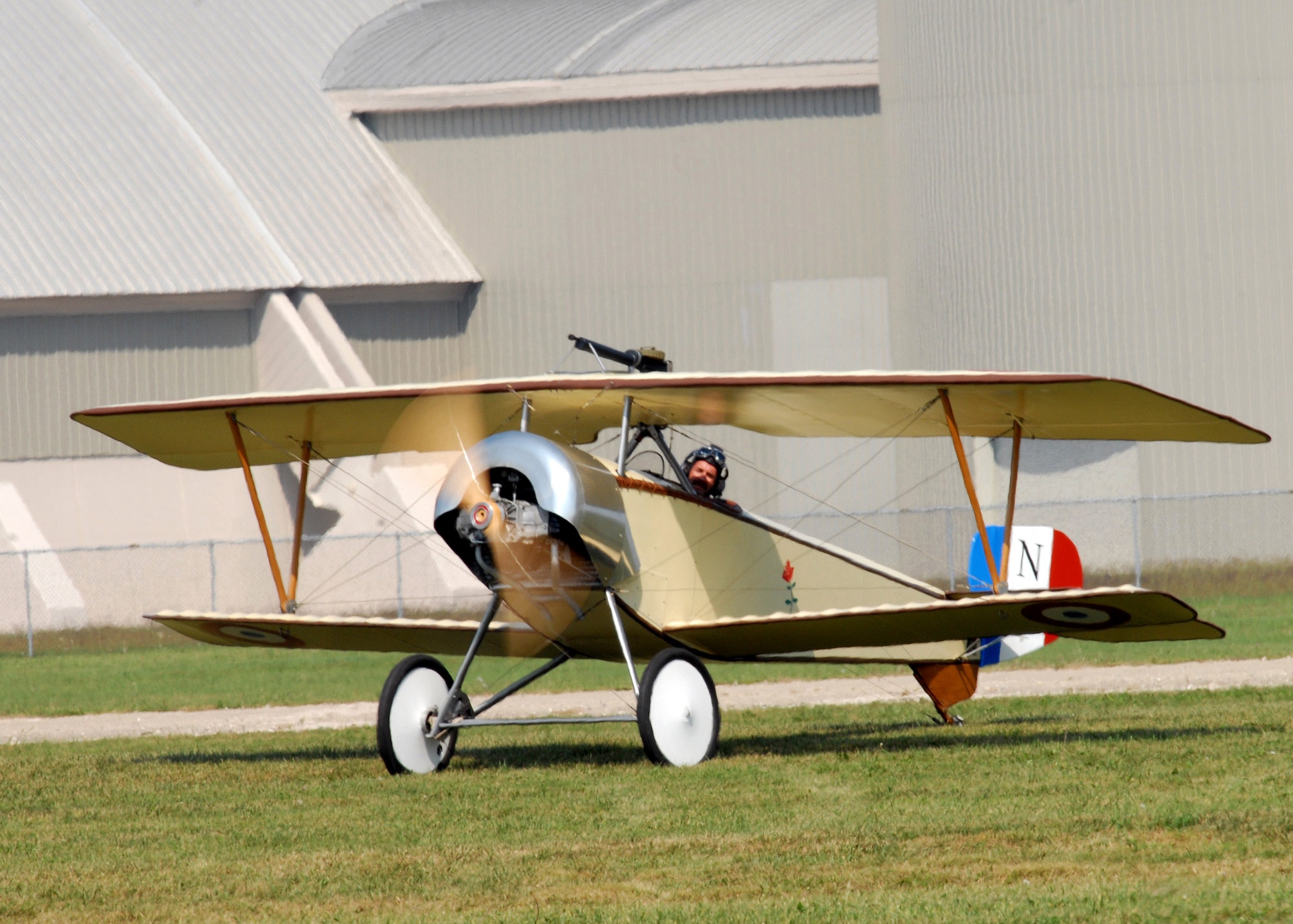 An aircraft lands after performing in a "flour bomb" target competition Sept. 22 at the Dawn Patrol Rendezvous World War I Fly-In on the grounds of the National Museum of the United States Air Force in Dayton, Ohio. Activities included period re-enactors in a war encampment setting, era automobiles on display and participating in a parade, flying exhibitions by WWI radio-controlled aircraft, and a collector's show for WWI 