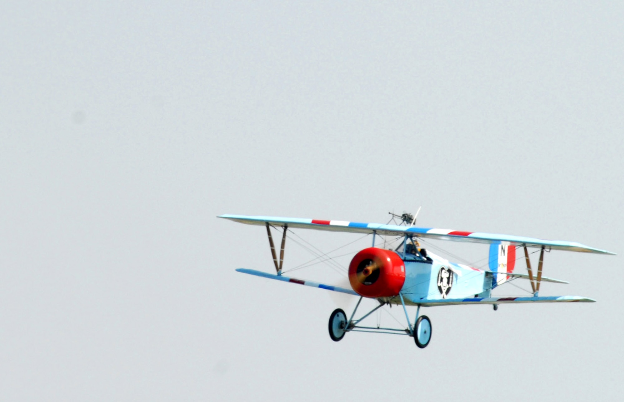 A pilot approaches the target during a "flour bomb" target competition Sept. 22 at the Dawn Patrol Rendezvous World War I Fly-In on the grounds of the National Museum of the United States Air Force in Dayton, Ohio. Activities included period re-enactors in a war encampment setting, era automobiles on display and participating in a parade, flying exhibitions by WWI radio-controlled aircraft, and a collector's show for WWI items.  (U.S. Air Force photo/Staff Sgt Joshua Strang)